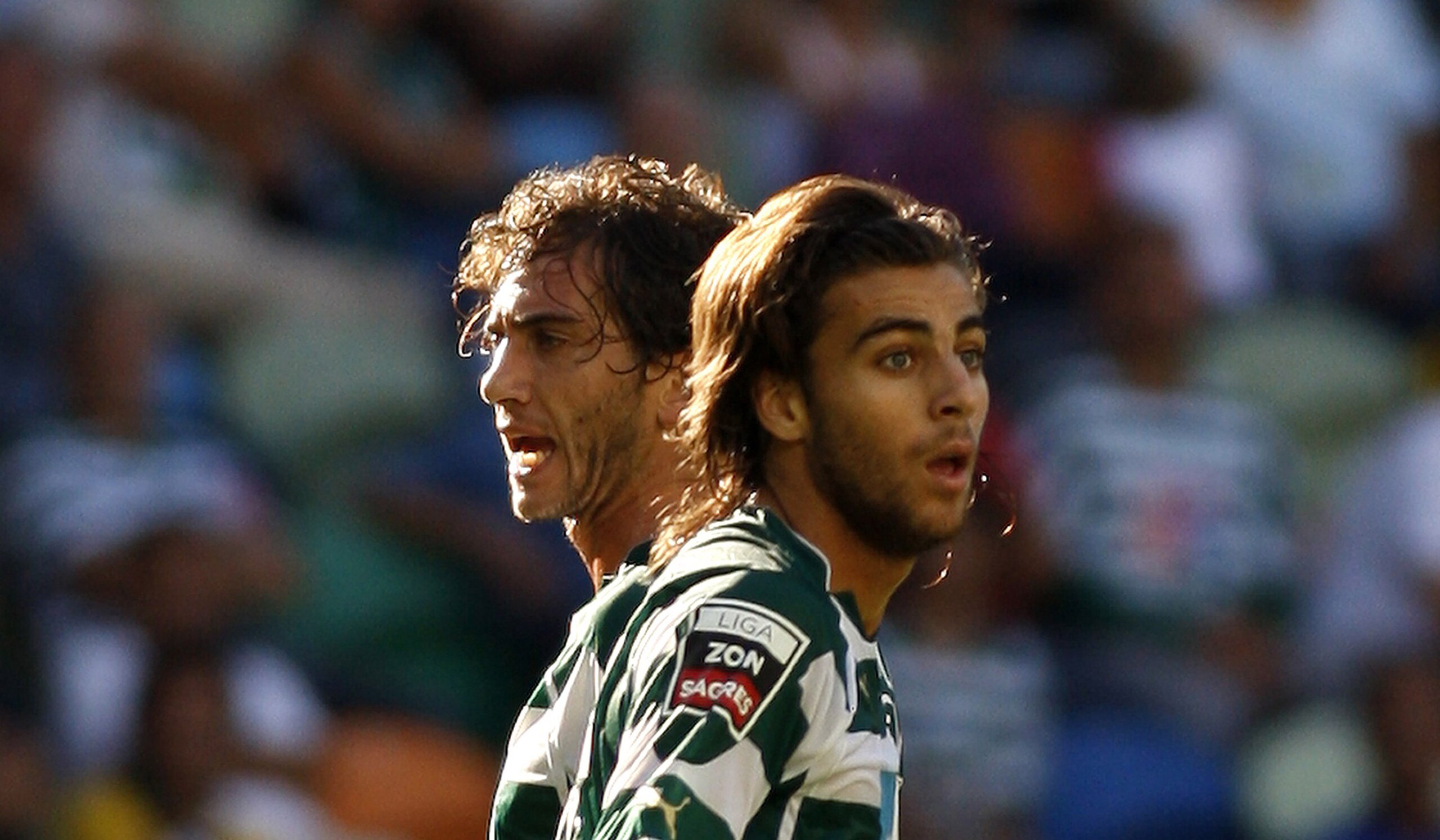 LISBON, PORTUGAL - AUGUST 22:  Defender Nuno Coelho (L) and midfielder Andre Santos (R) of Sporting Lisbon  react during the Portuguese Liga football match between Sporting Lisbon and  Maritimo at Alvalade Stadium on August 22, 2010 in Lisbon, Portugal. (