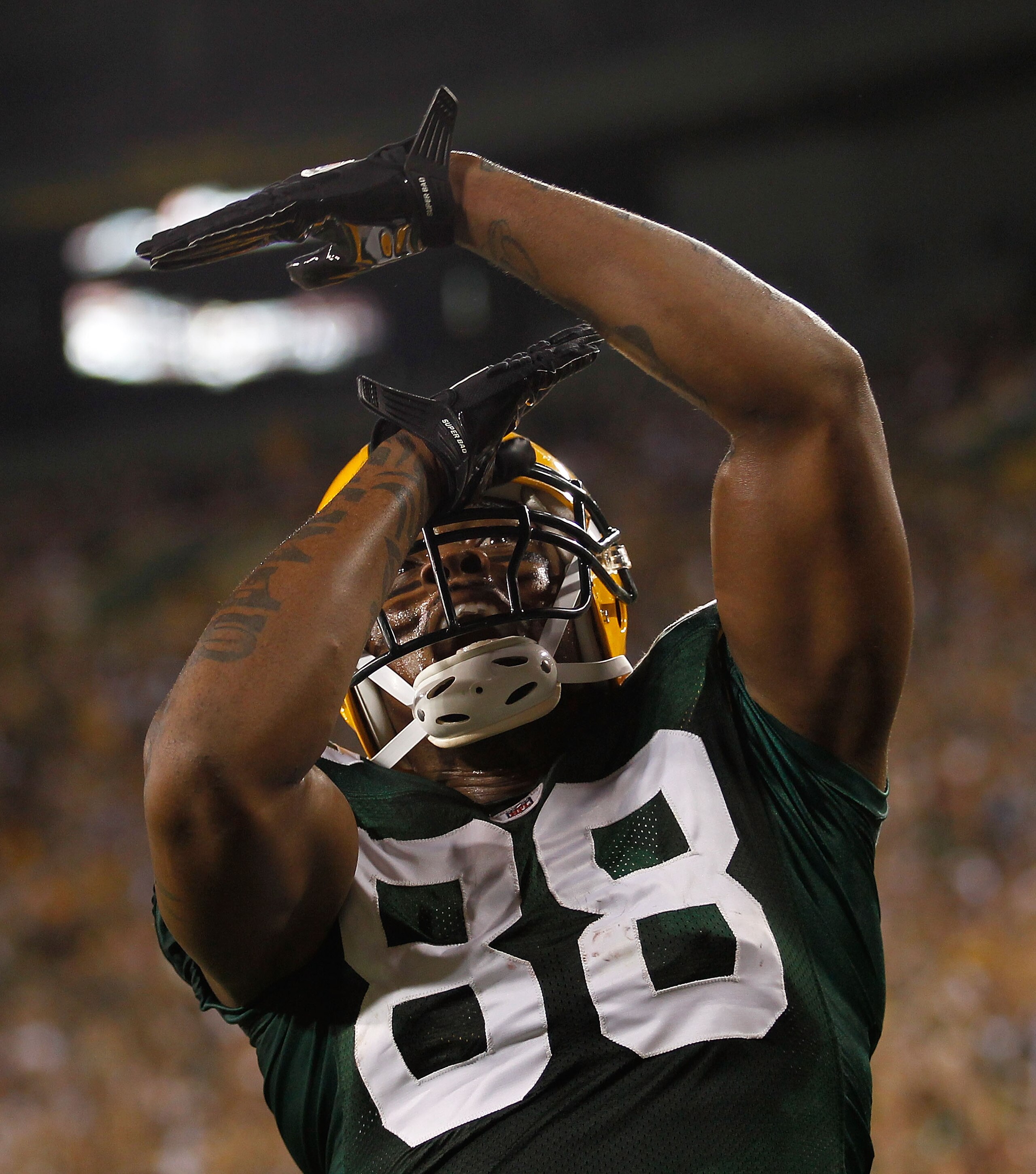 GREEN BAY, WI - AUGUST 26: Jermichael Finley #88 of the Green Bay Packers celebrates a touchdown catch against the Indianapolis Colts during a preseason game at Lambeau Field on August 26, 2010 in Green Bay, Wisconsin. The Packers defeated the Colts 59-24