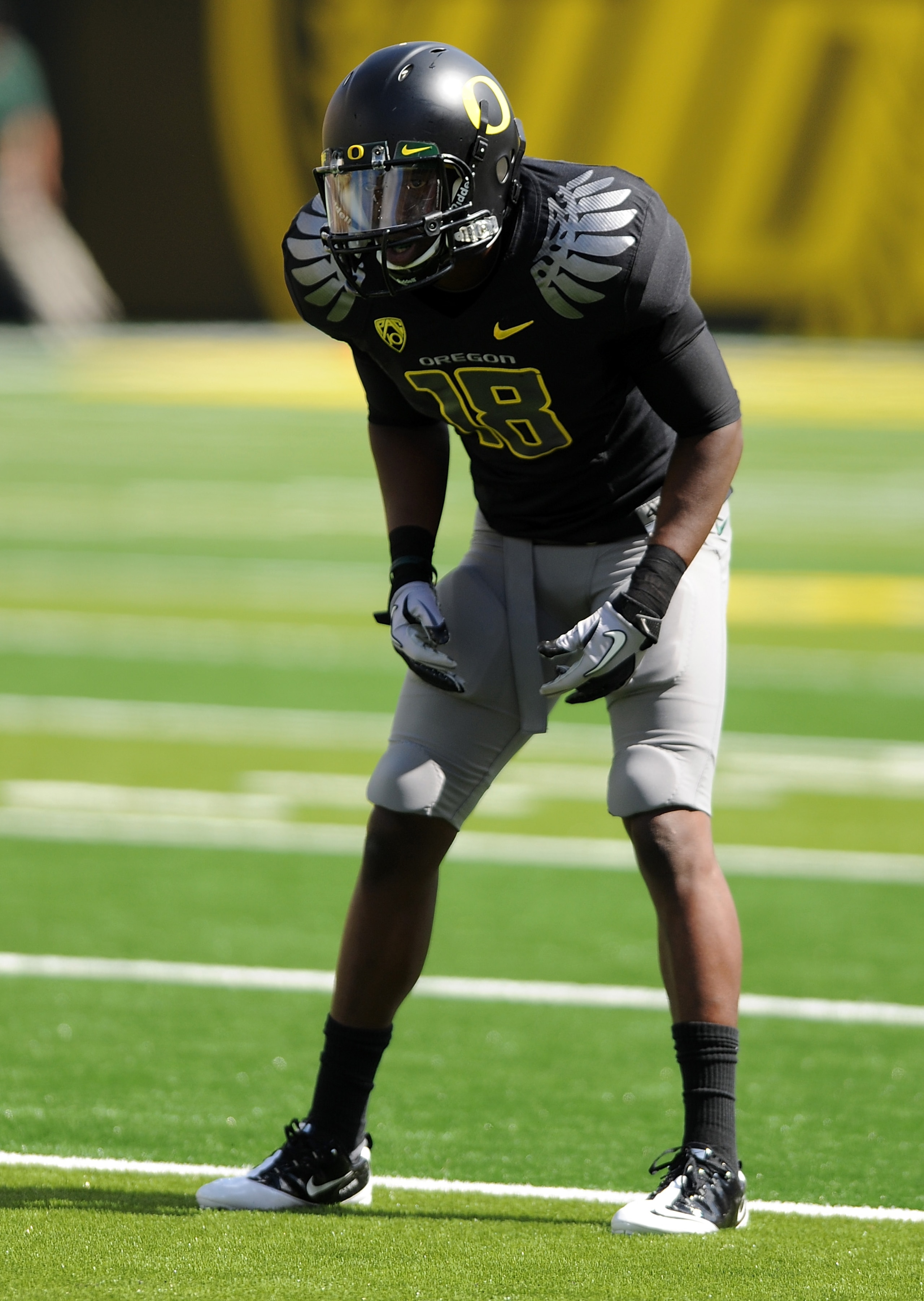 EUGENE, OR - SEPTEMBER 04:  Cornerback Anthony Gildon #18 of the Oregon Ducks gets set at the line of scrimmage in the second quarter of the game against the New Mexico Lobos at Autzen Stadium on September 4, 2010 in Eugene, Oregon. Oregon won the game 72