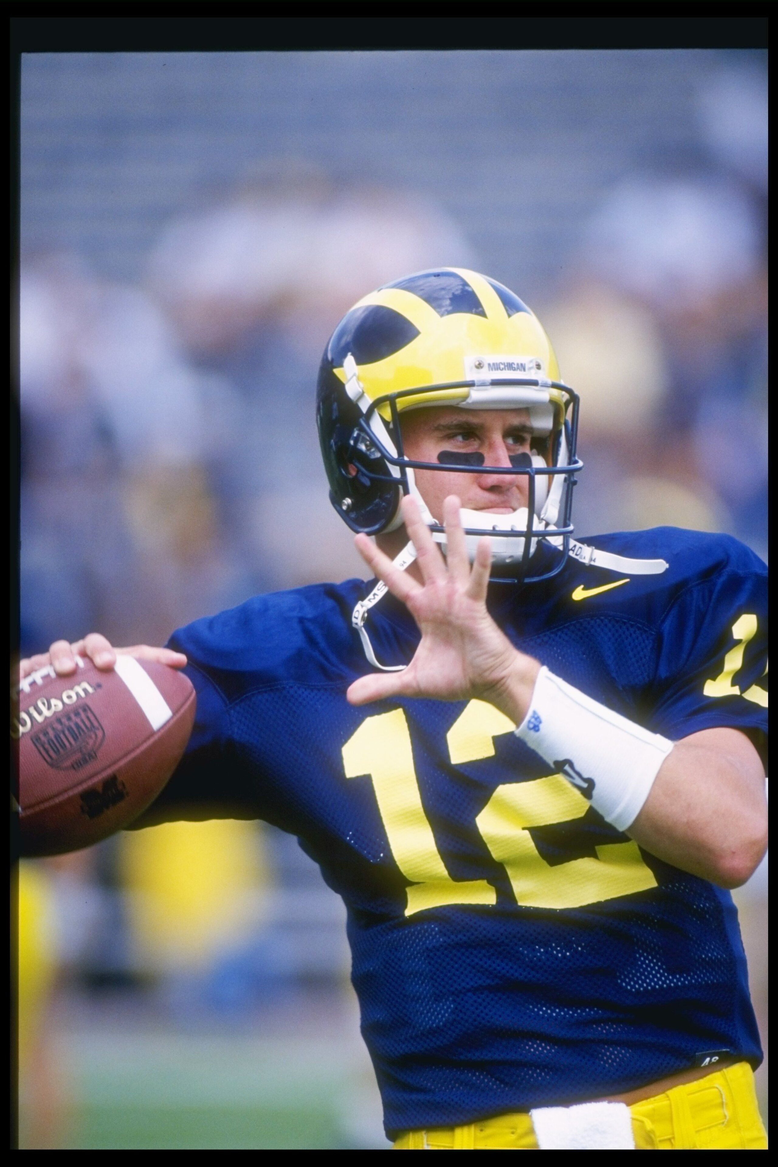 31 Aug 1996: Quarterback Scott Dreisbach of the Michigan Wolverines passes the ball before a game against the Illinois Fighting Illini at Michigan Stadium in Ann Arbor, Michigan. Michigan won the game 20-8.