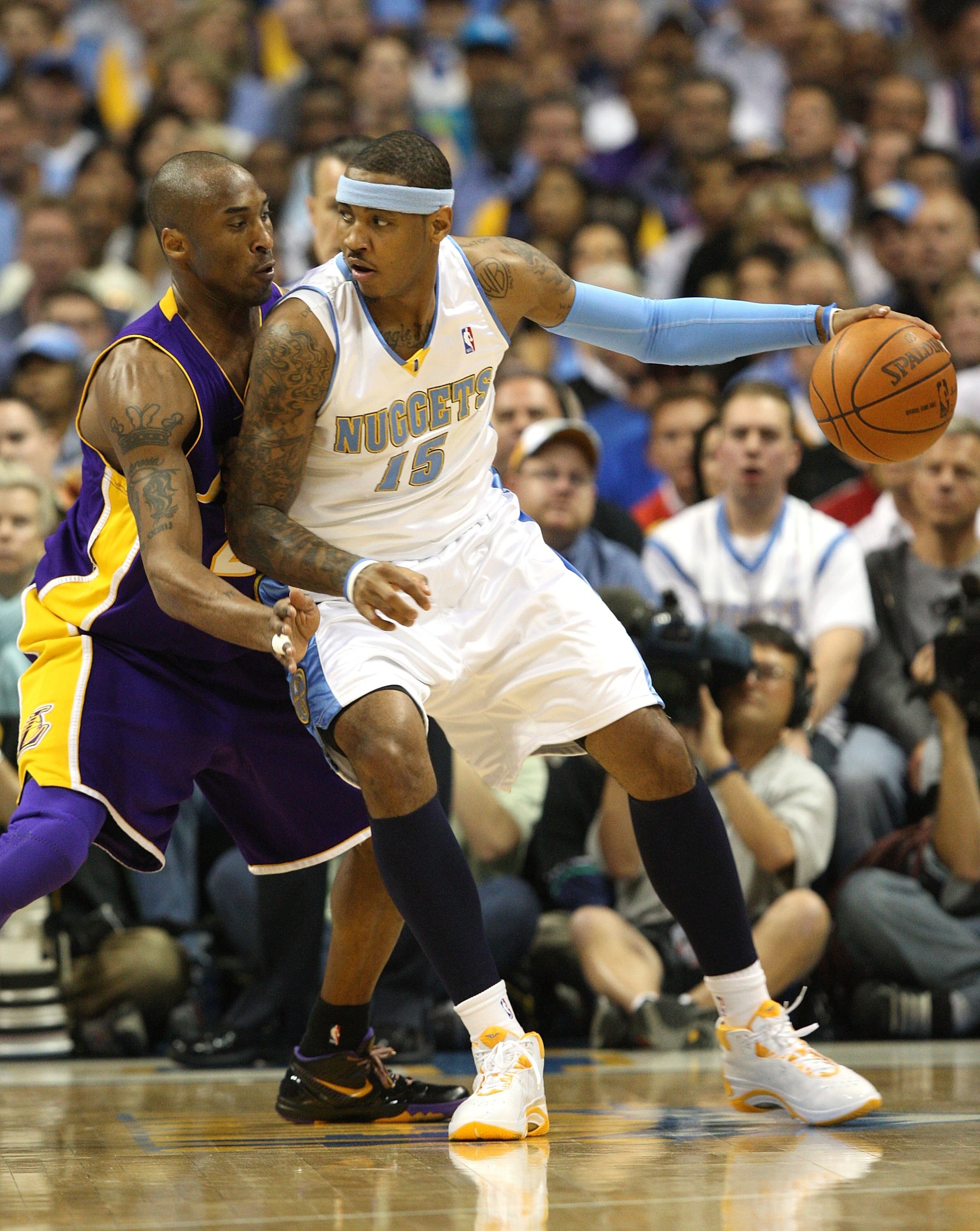 DENVER - MAY 25:  Kobe Bryant #24 of the Los Angeles Lakers defends against Carmelo Anthony #15 of the Denver Nuggets in Game Four of the Western Conference Finals during the 2009 NBA Playoffs at Pepsi Center on May 25, 2009 in Denver, Colorado. NOTE TO U