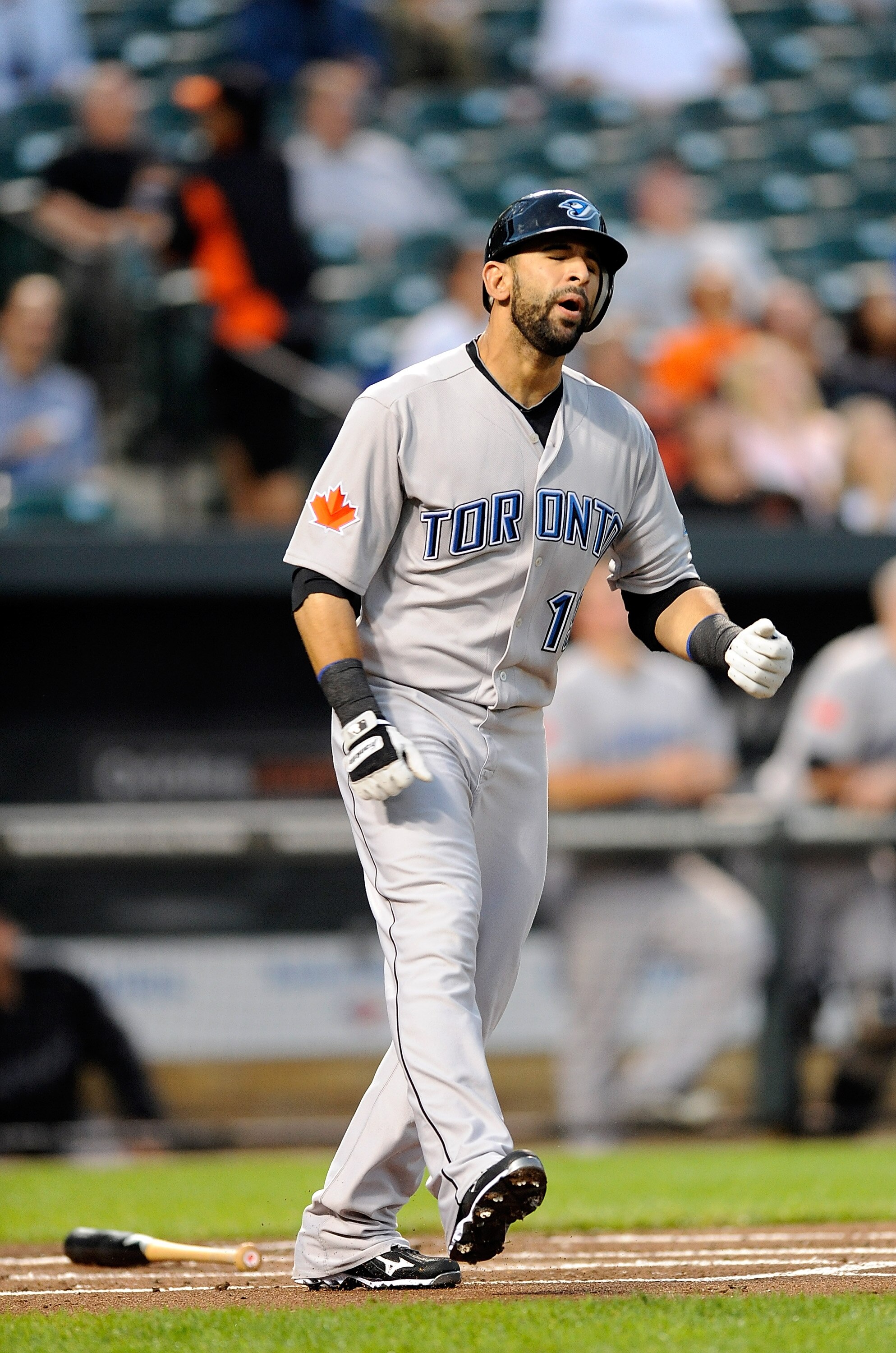 BALTIMORE - SEPTEMBER 13:  Jose Bautista #19 of the Toronto Blue Jays reacts after flying out during the game against the Baltimore Orioles at Camden Yards on September 13, 2010 in Baltimore, Maryland.  (Photo by Greg Fiume/Getty Images)