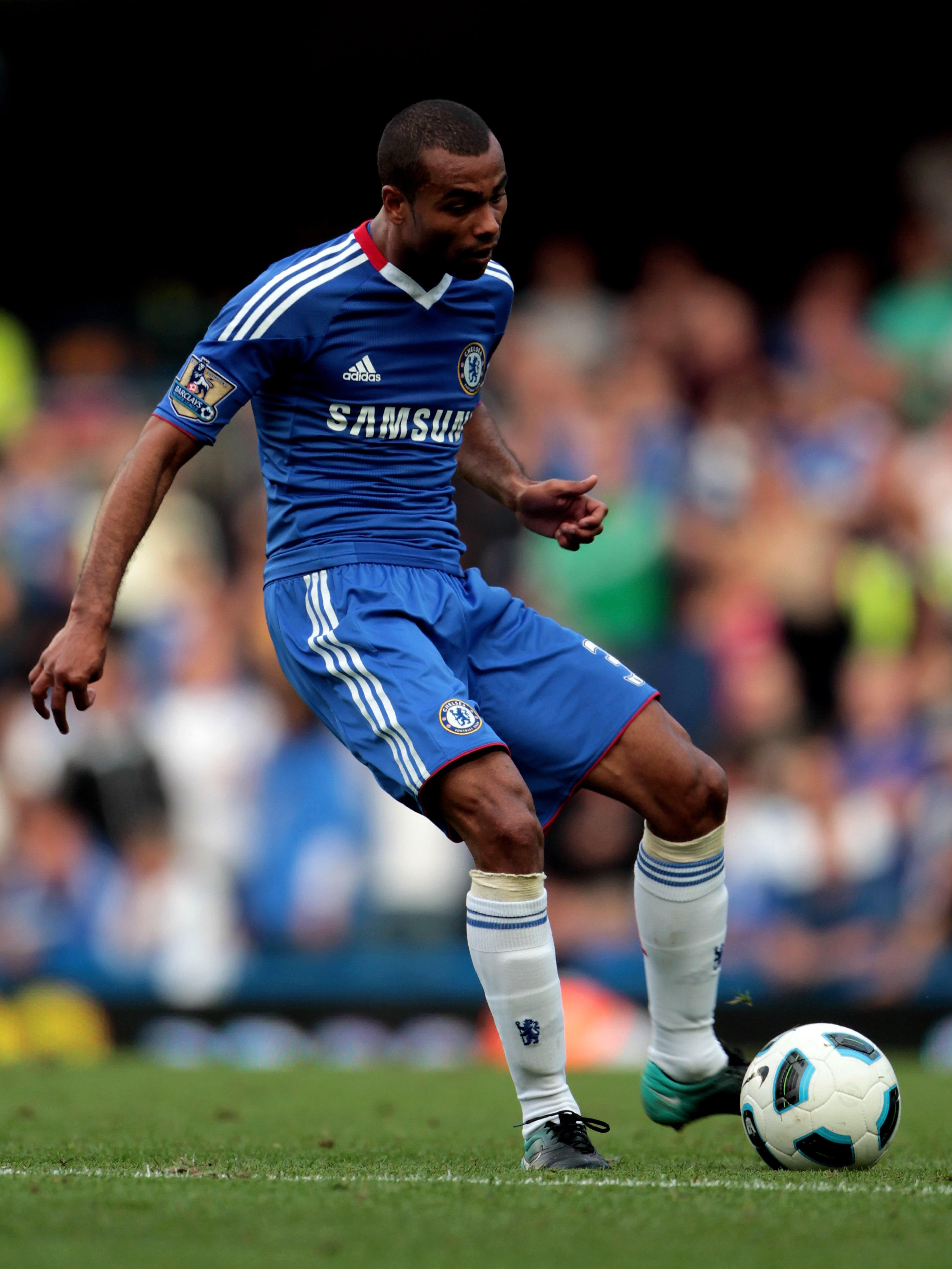 LONDON, ENGLAND - AUGUST 14:  Ashley Cole of Chelsea passes the ball during the Barclays Premier League match between Chelsea and West Bromwich Albion at Stamford Bridge on August 14, 2010 in London, England.  (Photo by Phil Cole/Getty Images)
