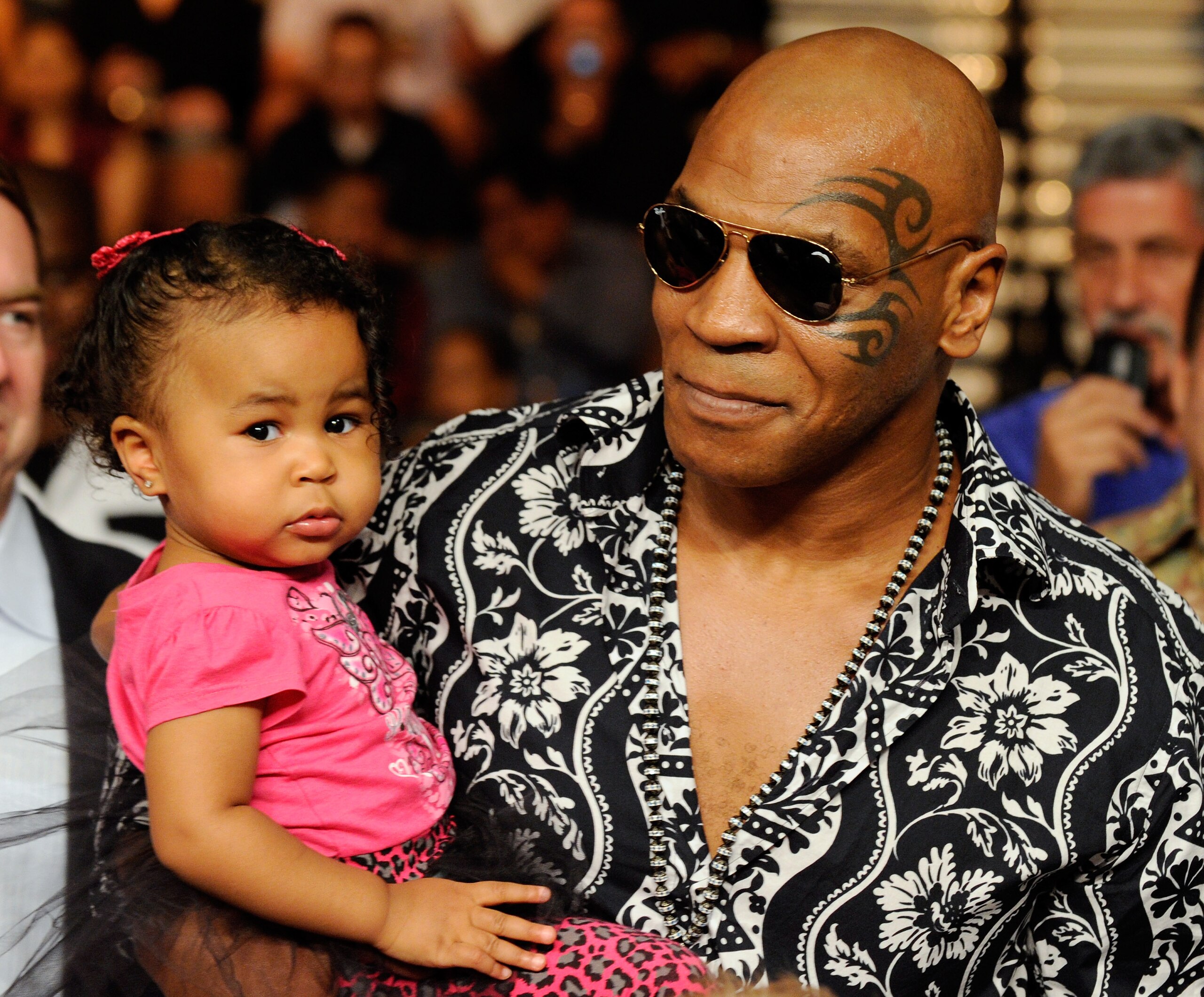 LAS VEGAS - JULY 31:  Mike Tyson holds his daughter Milan as he arrives at the  Juan Manuel Marquez and Juan Diaz bout at the Mandalay Bay Events Center July 31, 2010 in Las Vegas, Nevada.  (Photo by Ethan Miller/Getty Images)
