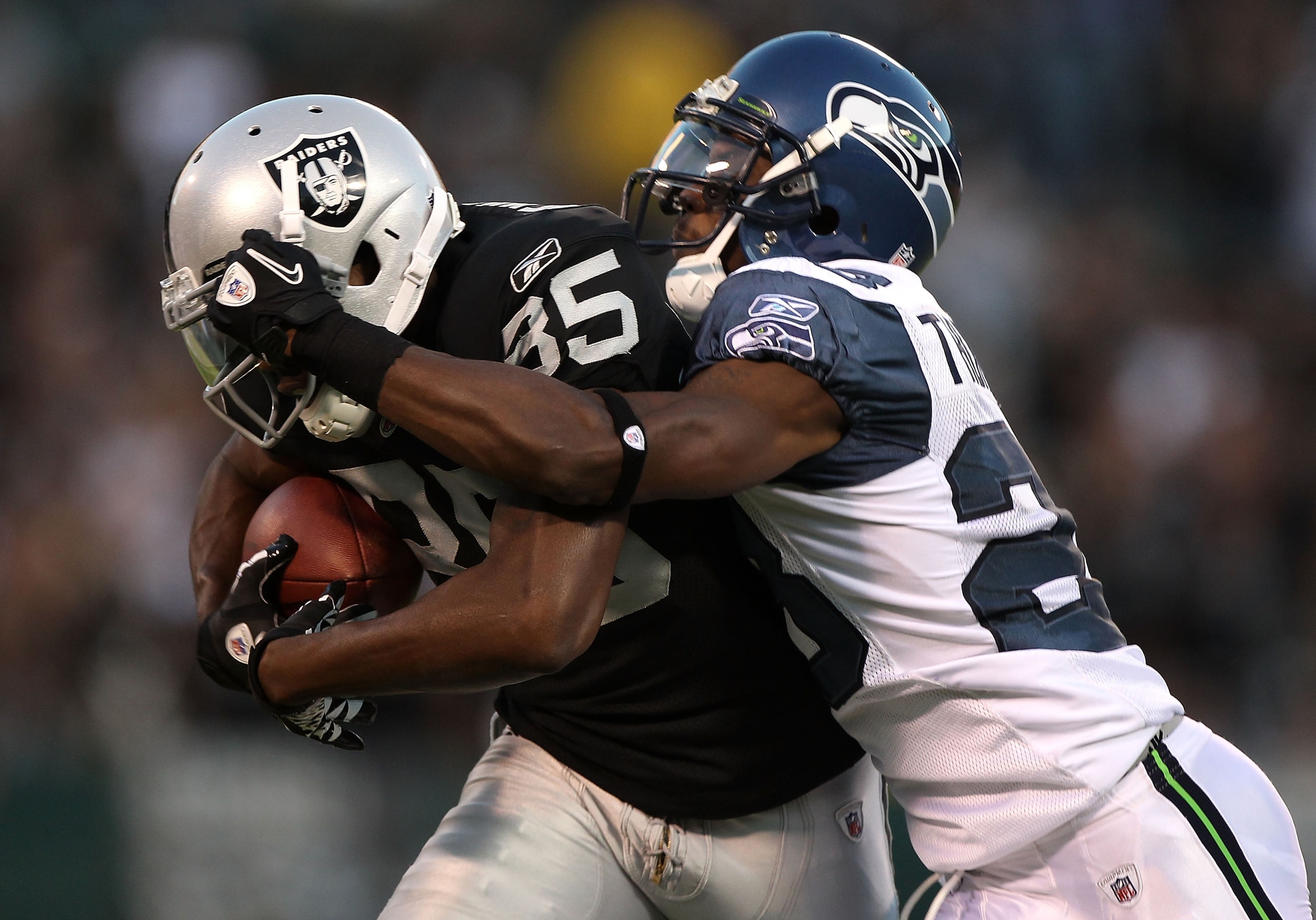 OAKLAND, CA - SEPTEMBER 02: Darrius Heyward-Bey #85 of the Oakland Raiders catches a pass over Walter Thurmond #28 of the Seattle Seahawks during an NFL preseason game at Oakland-Alameda County Coliseum on September 2, 2010 in Oakland, California. (Phot OAKLAND, CA - SEPTEMBER 02: Darrius Heyward-Bey #85 of the Oakland Raiders catches a pass over Walter Thurmond #28 of the Seattle Seahawks during an NFL preseason game at Oakland-Alameda County Coliseum on September 2, 2010 in Oakland, California. (Phot