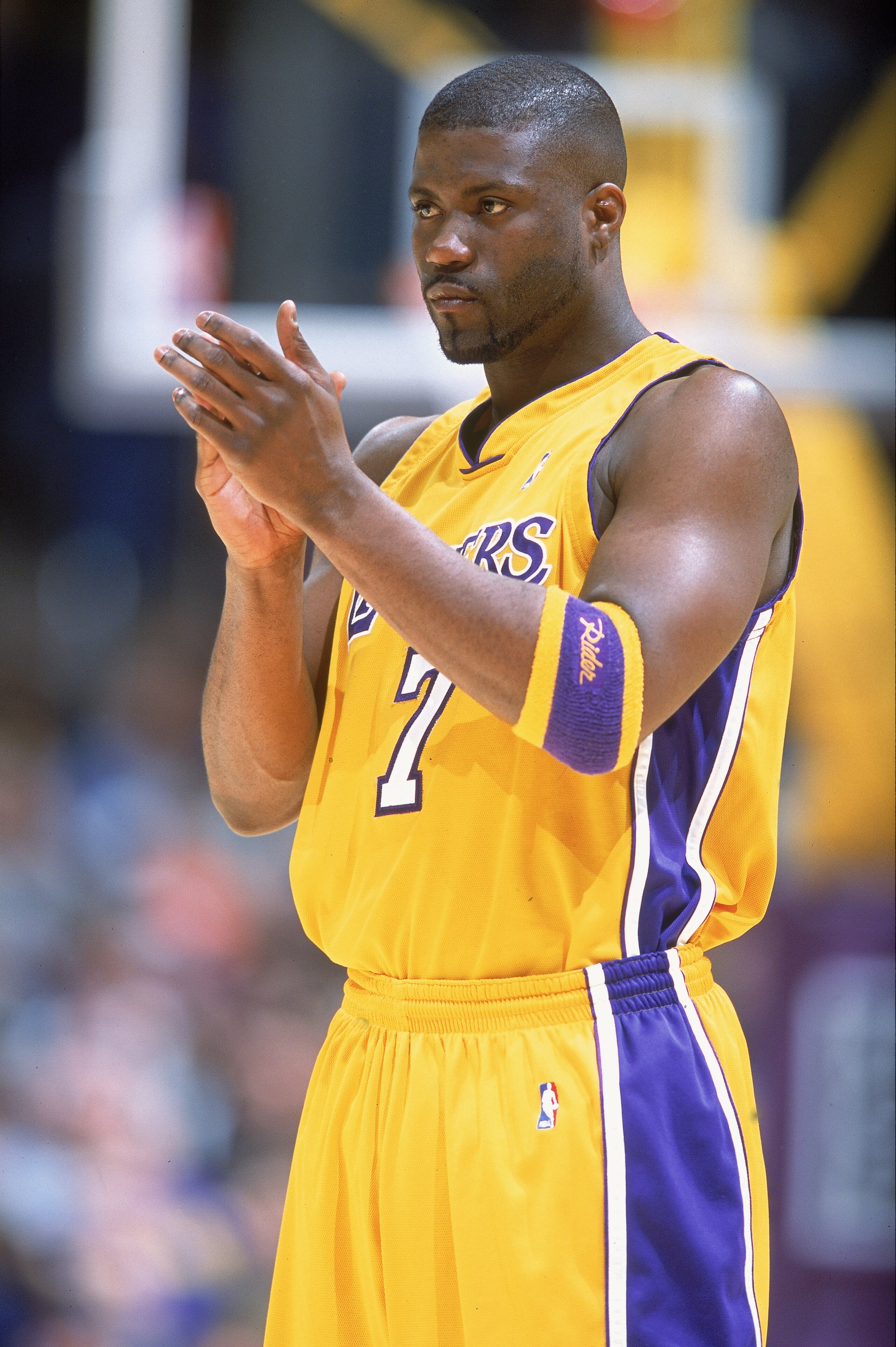 7 Feb 2001:  Isaiah Rider #7 of the Los Angeles Lakers claps his hands during the game against the Phoenix Sun at the STAPLES Center in Los Angeles, California.  The Lakers defeated the Suns 85-83.   NOTE TO USER: It is expressly understood that the only