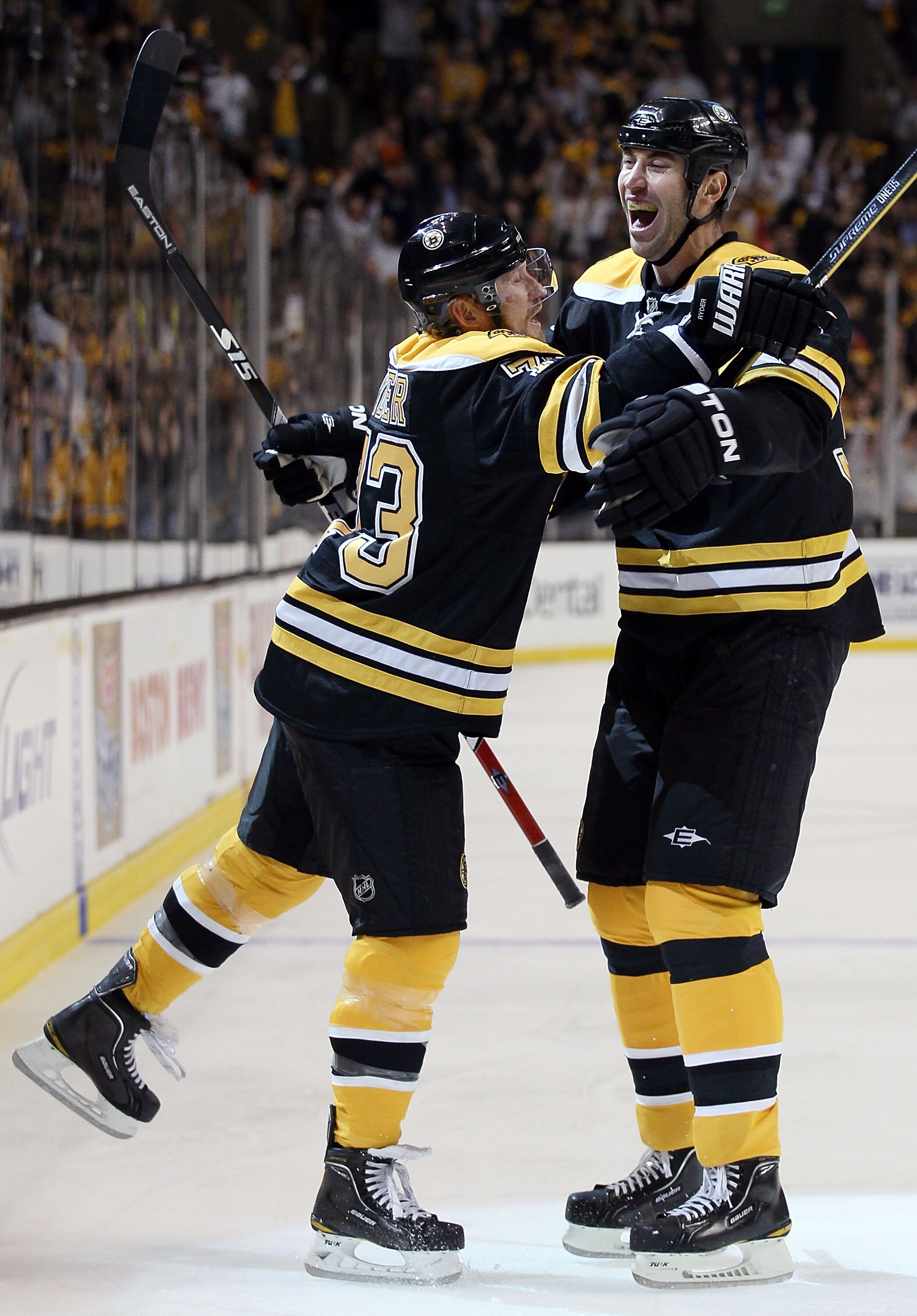 BOSTON - MAY 14:  Michael Ryder #73 of the Boston Bruins celebrates his goal with teammate Zdeno Chara #33 in the first period against the Philadelphia Flyers in Game Seven of the Eastern Conference Semifinals during the 2010 NHL Stanley Cup Playoffs at T