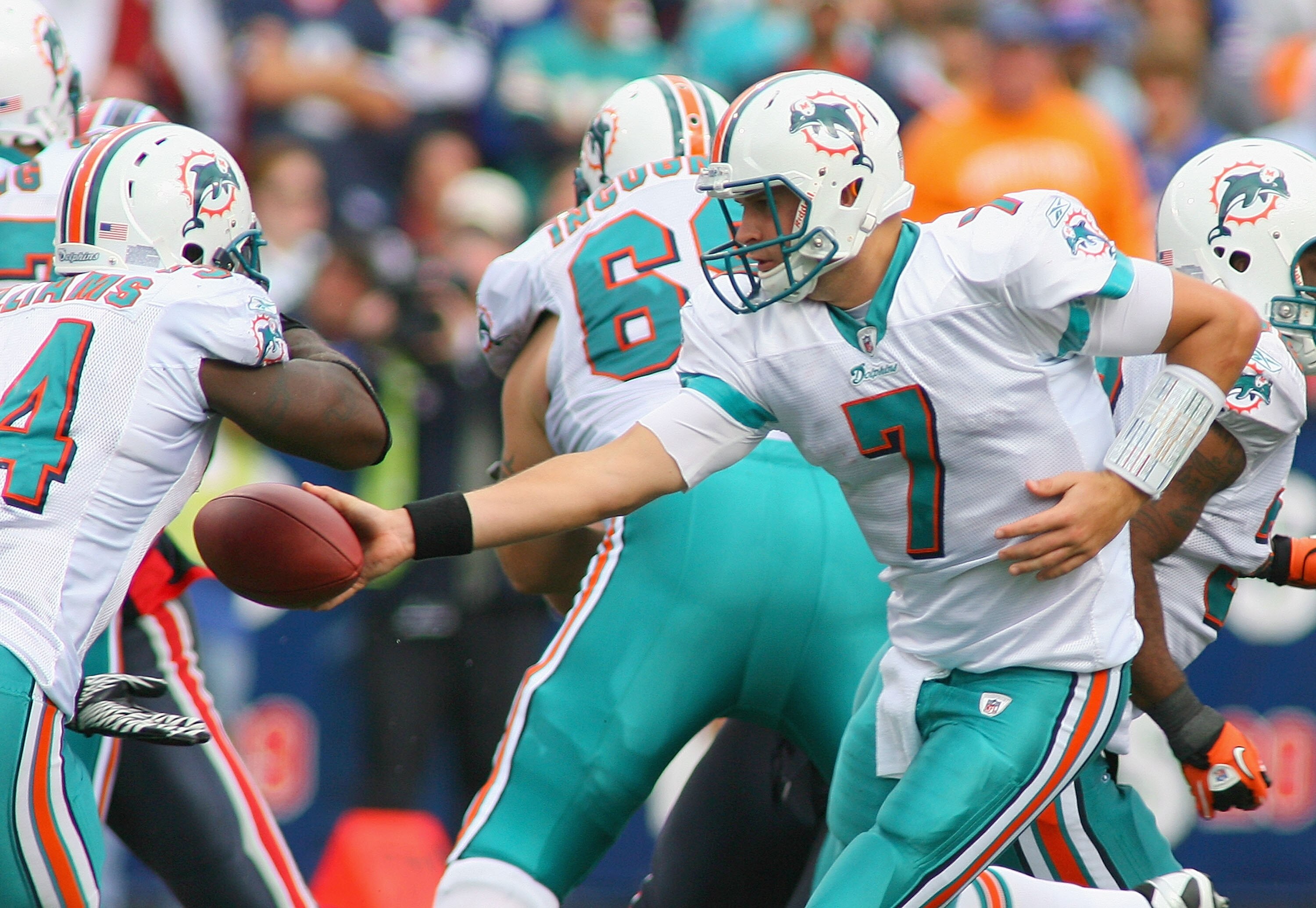 ORCHARD PARK, NY - SEPTEMBER 12: Chad Henne #7 of the Miami Dolphins hands off to Ricky Williams #34 during the NFL season opener against the Buffalo Bills at Ralph Wilson Stadium on September 12, 2010 in Orchard Park, New York. Miami won 15-10. (Photo ORCHARD PARK, NY - SEPTEMBER 12: Chad Henne #7 of the Miami Dolphins hands off to Ricky Williams #34 during the NFL season opener against the Buffalo Bills at Ralph Wilson Stadium on September 12, 2010 in Orchard Park, New York. Miami won 15-10. (Photo
