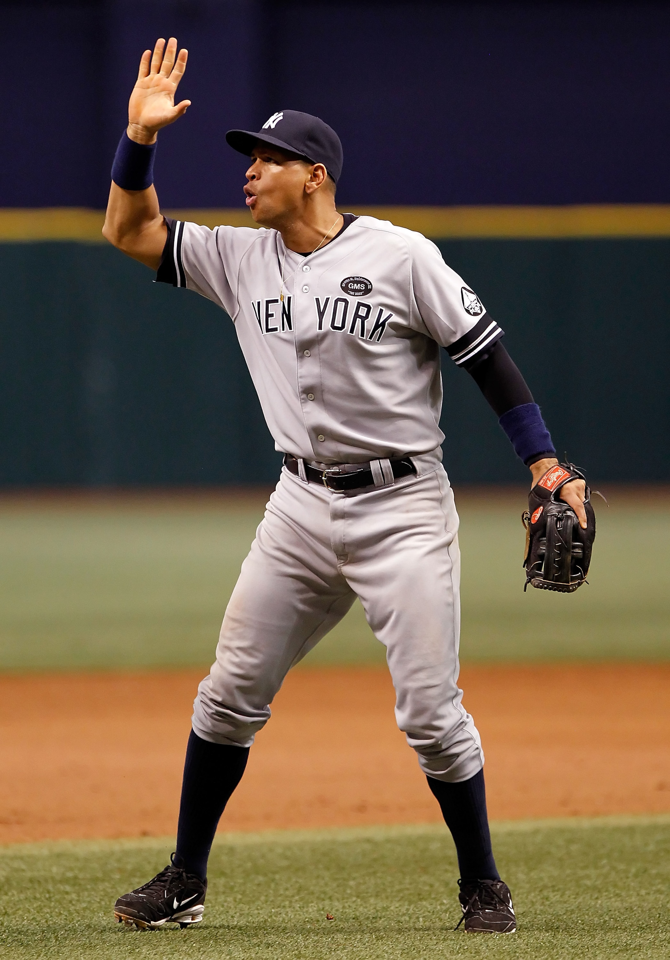 ST PETERSBURG, FL - SEPTEMBER 14:  Infielder Alex Rodriguez #13 of the New York Yankees celebrates his team's victory over the Tampa Bay Rays at Tropicana Field on September 14, 2010 in St. Petersburg, Florida.  (Photo by J. Meric/Getty Images)