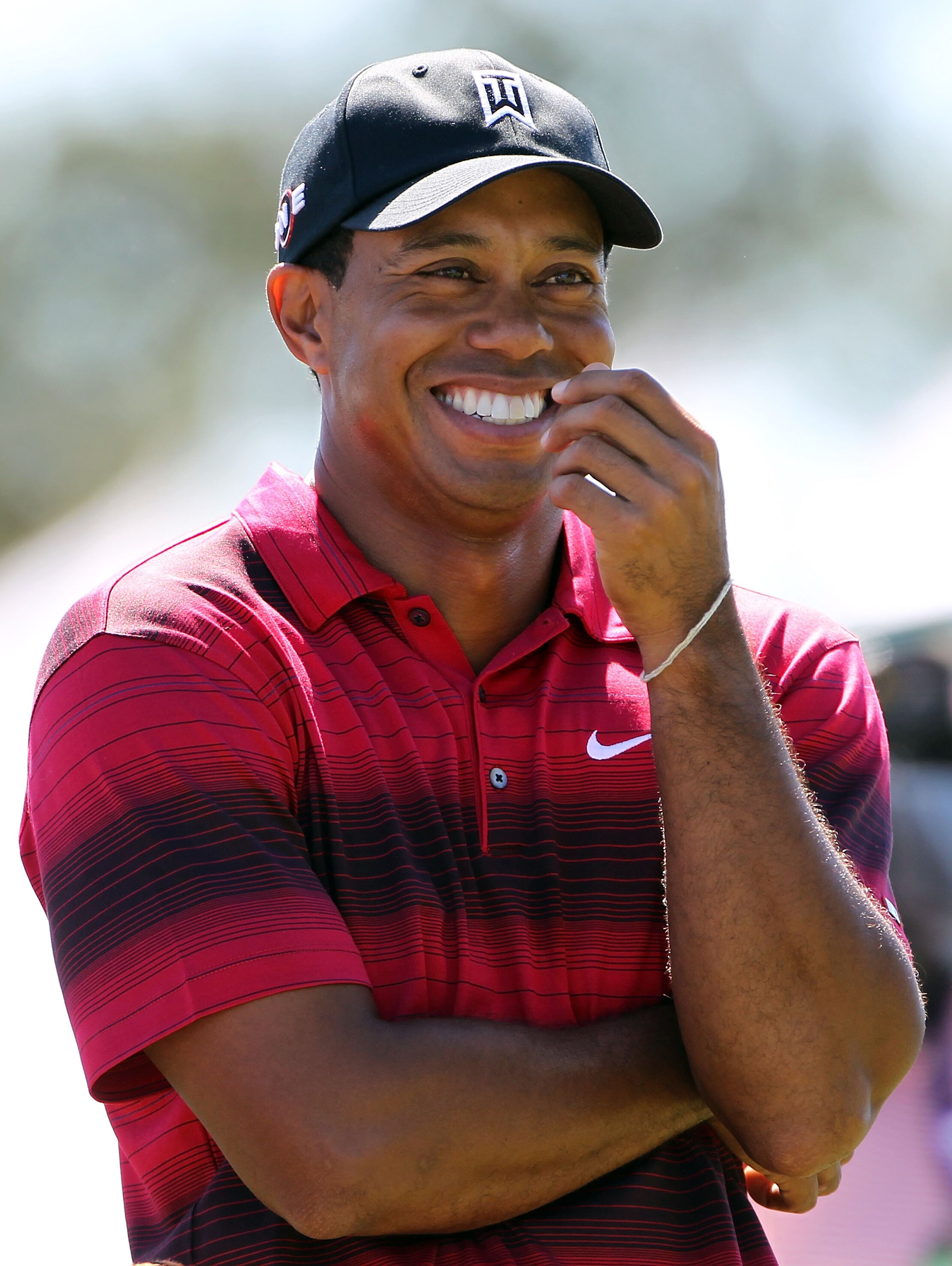LEMONT, IL - SEPTEMBER 12:  Tiger Woods smiles during the final round of the BMW Championship at Cog Hill Golf & Country Club on September 12, 2010 in Lemont, Illinois.  (Photo by Jamie Squire/Getty Images)