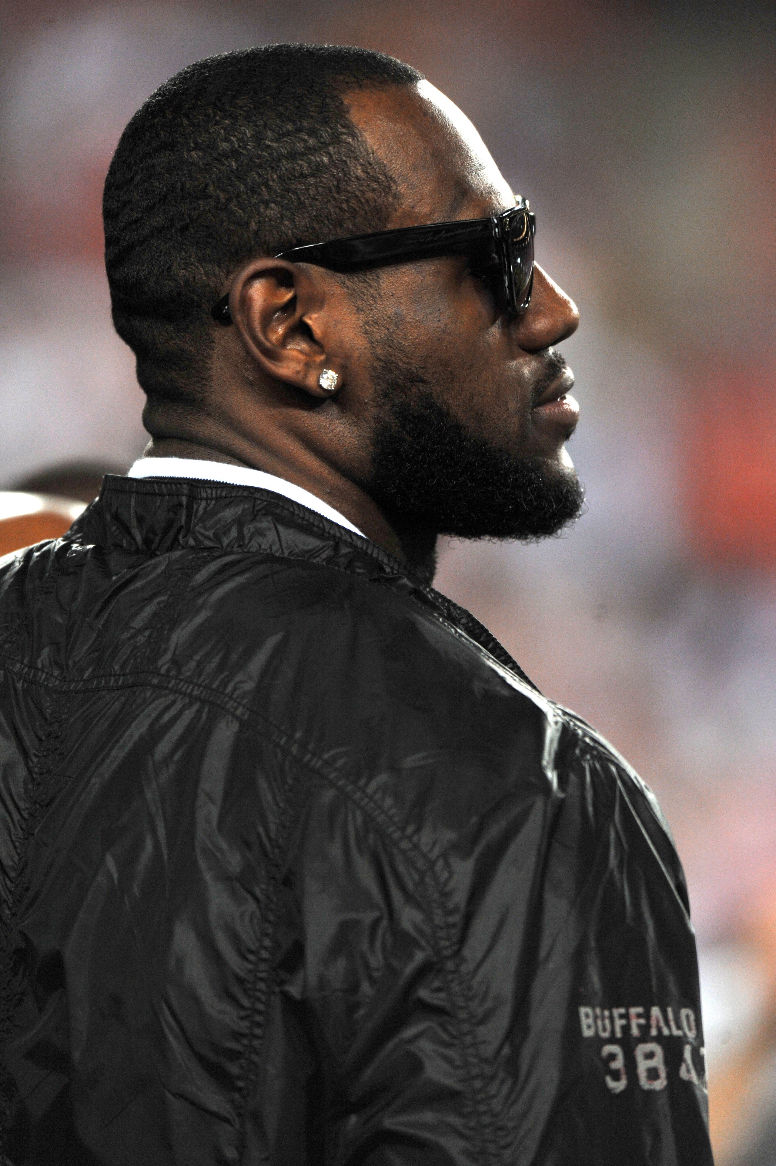 LANDOVER - SEPTEMBER 12:  LeBron James of the Miami Heat walks the sidelines before the game between the Washington Redskins and the Dallas Cowboys before the NFL season opener against at FedExField on September 12, 2010 in Landover, Maryland. The Redskin
