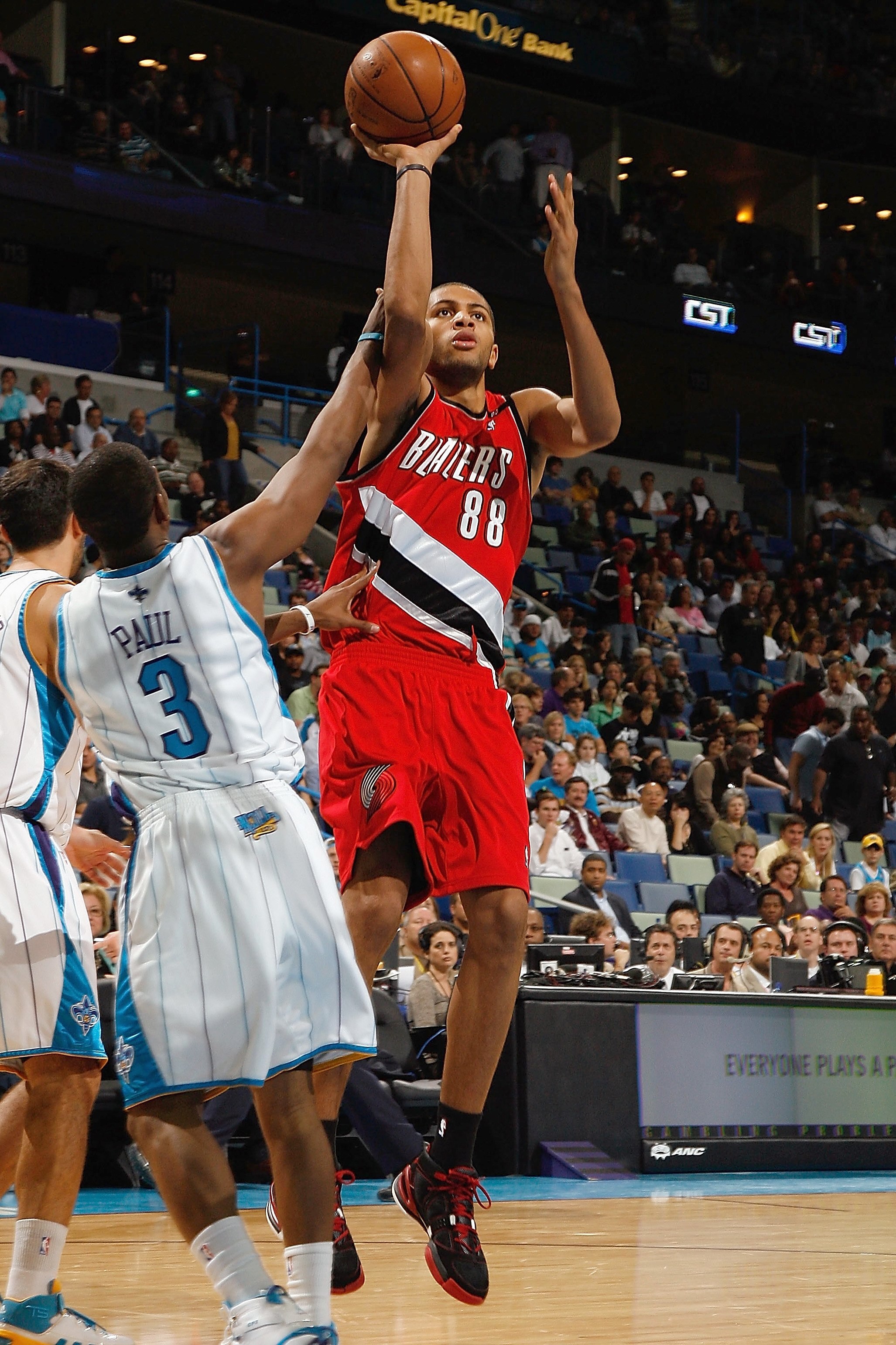 NEW ORLEANS - NOVEMBER 14:  Nicolas Batum #88 of the Portland Trail Blazers shoots against Chris Paul #3 of the New Orleans Hornets during the game at the New Orleans Arena on November 14, 2008 in New Orleans, Louisiana.  The Hornets defeated the Trail Bl