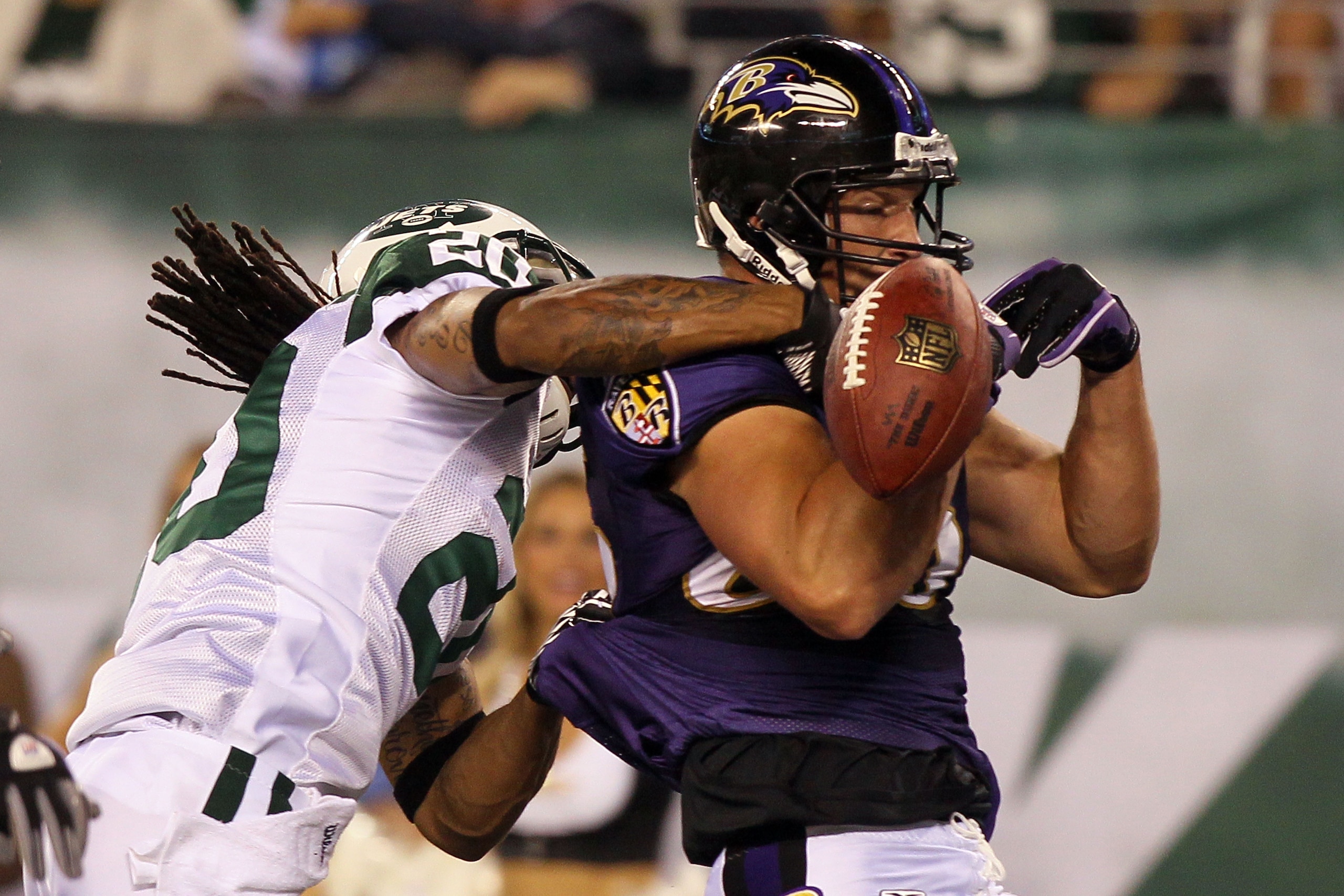 EAST RUTHERFORD, NJ - SEPTEMBER 13:  Todd Heap #86 of the Baltimore Ravens misses a pass as he is covered by Kyle Wilson #20 of the New York Jets during their home opener at the New Meadowlands Stadium on September 13, 2010 in East Rutherford, New Jersey.