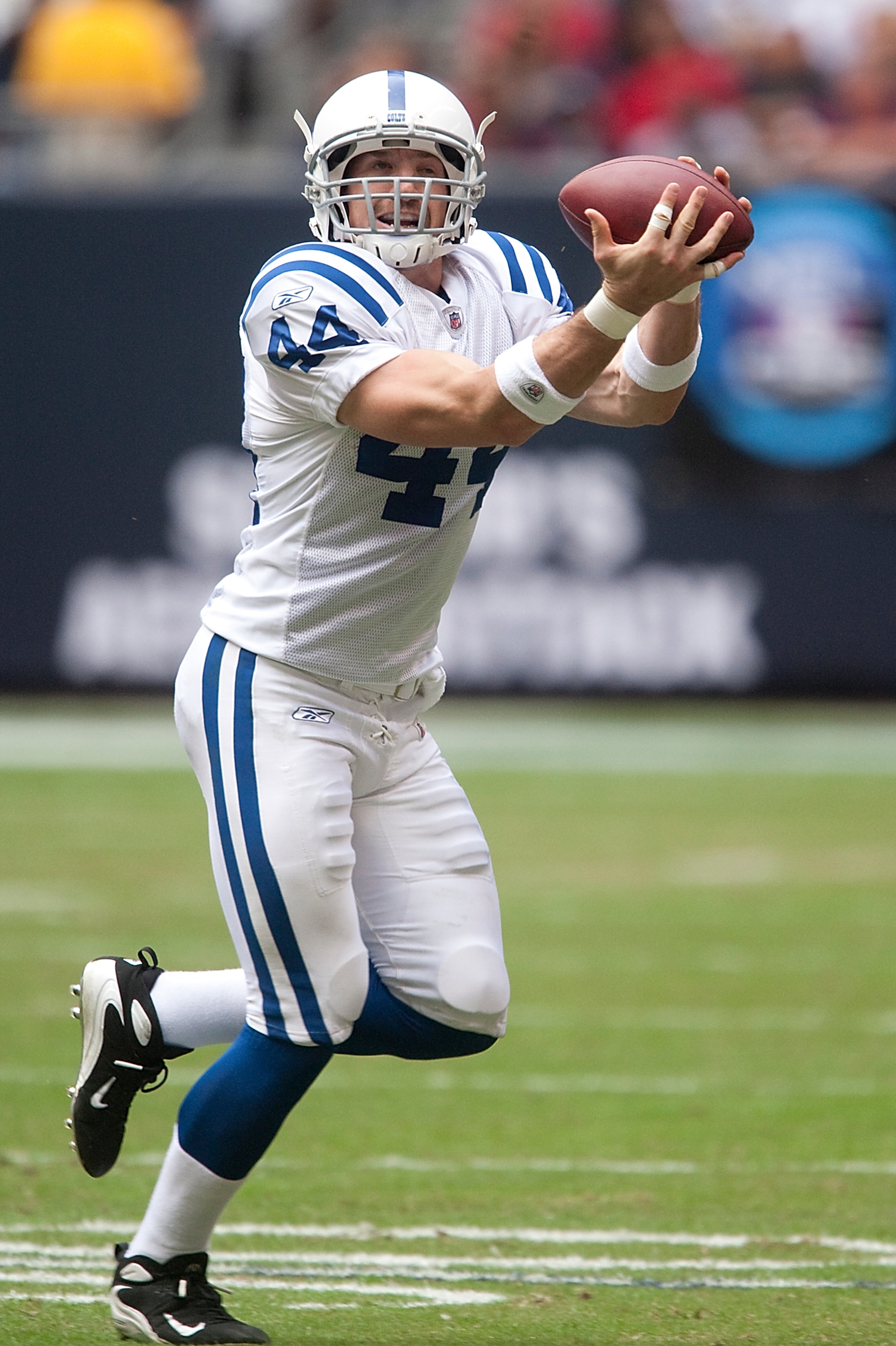 HOUSTON - NOVEMBER 29:  Running back Dallas Clark #44 of the Indianapolis Colts completes a reception in the first quarter against the Houston Texans at Reliant Stadium on November 29, 2009 in Houston, Texas.  (Photo by Bob Levey/Getty Images)