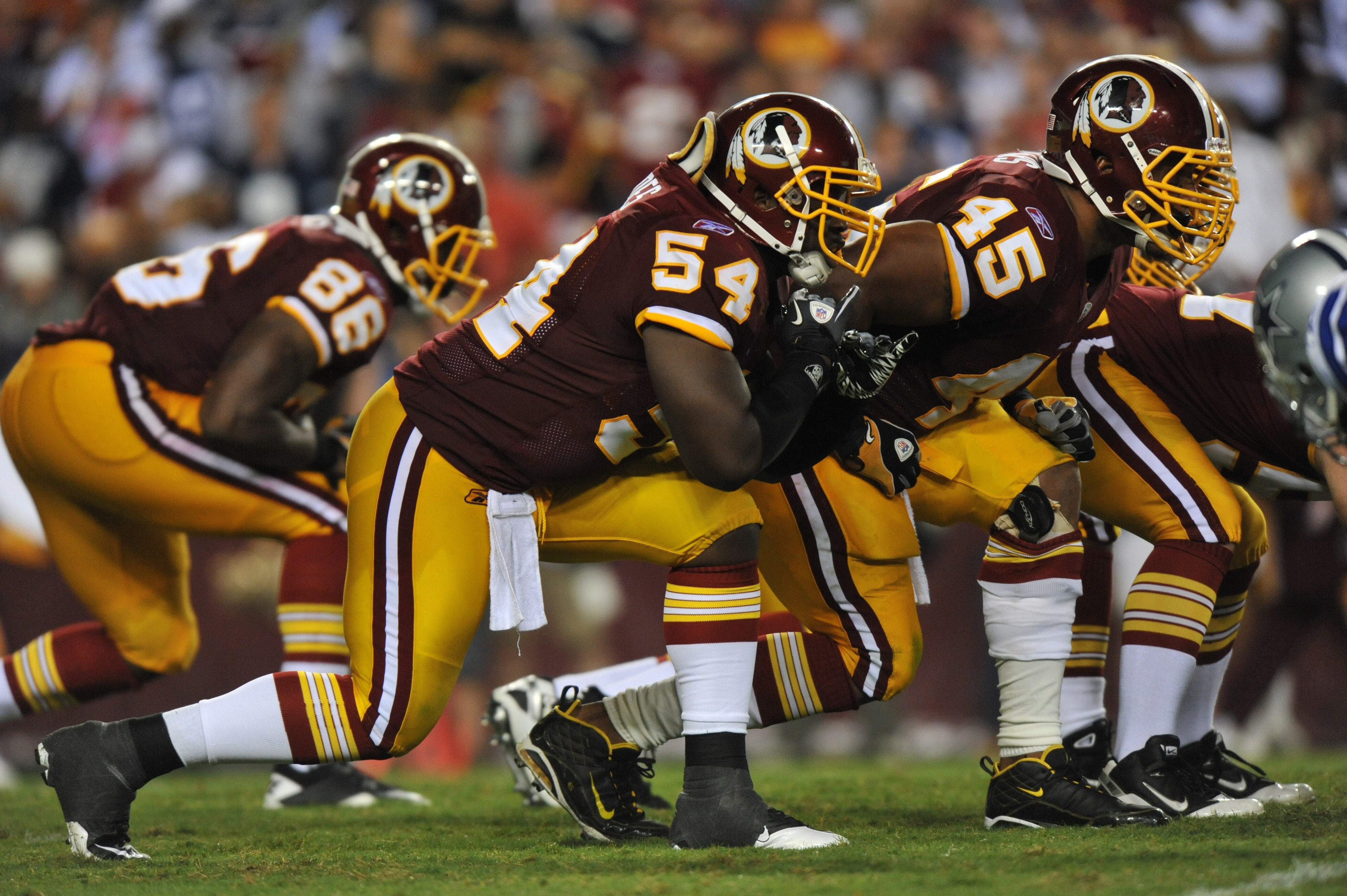 LANDOVER - SEPTEMBER 12:  H.B. Blades #54 of the Washington Redskins defends during the NFL season opener against the Dallas Cowboys at FedExField on September 12, 2010 in Landover, Maryland. The Redskins defeated the Cowboys 13-7. (Photo by Larry French/