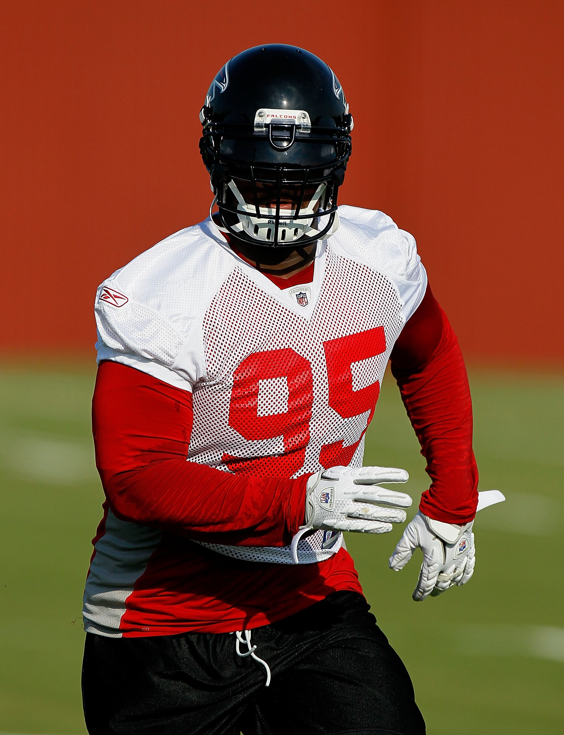 FLOWERY BRANCH, GA - JULY 30:  Jonathan Babineaux #95 of the Atlanta Falcons runs drills during opening day of training camp on July 30, 2010 at the Falcons Training Complex in Flowery Branch, Georgia.  (Photo by Kevin C. Cox/Getty Images)