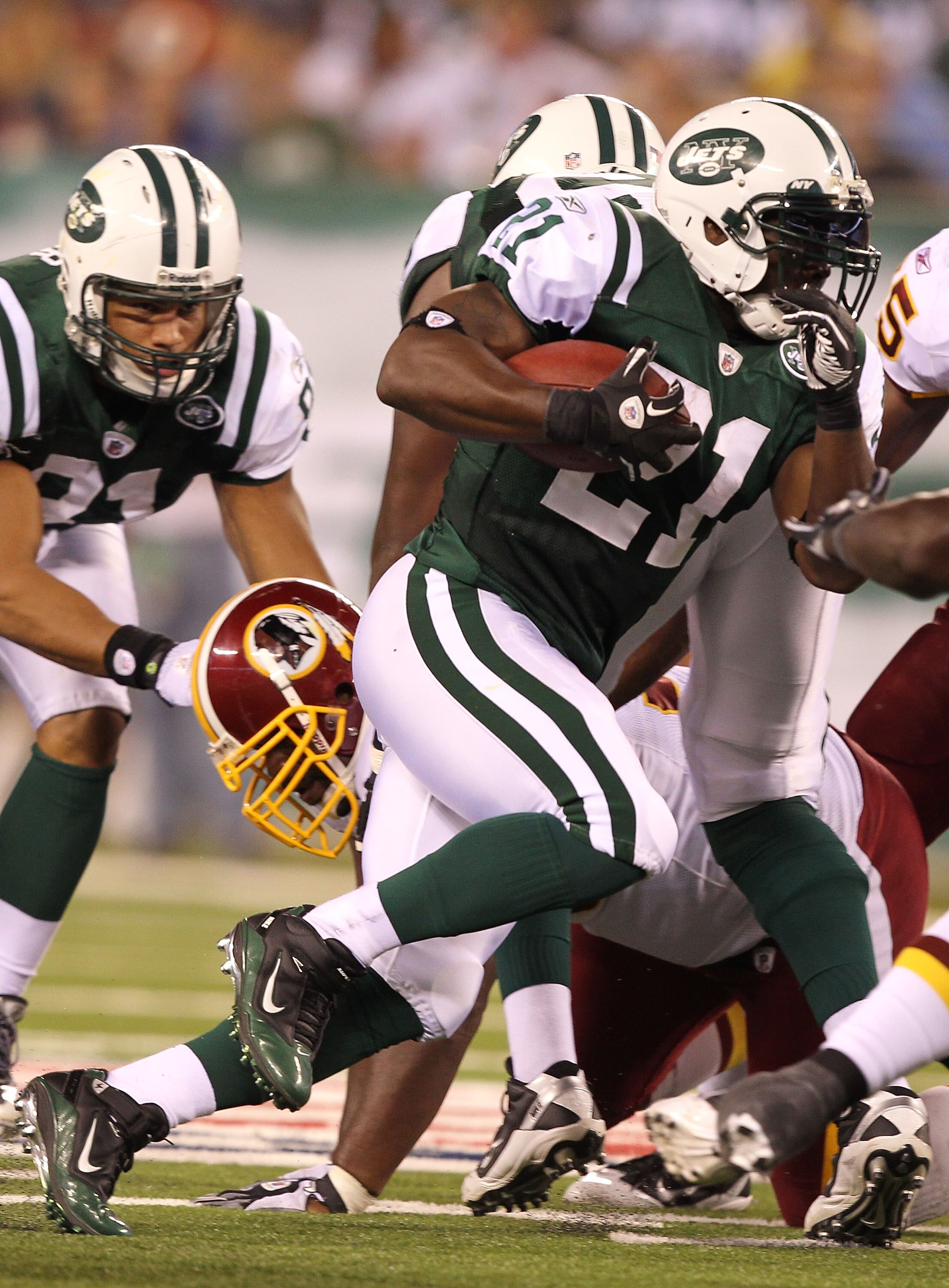 EAST RUTHERFORD, NJ - AUGUST 27:  LaDainian Tomlinson #21 of the New York Jets in action against the Washington Redskins  during their preseason game on August 27, 2010 at the New Meadowlands Stadium  in East Rutherford, New Jersey.  (Photo by Al Bello/Ge