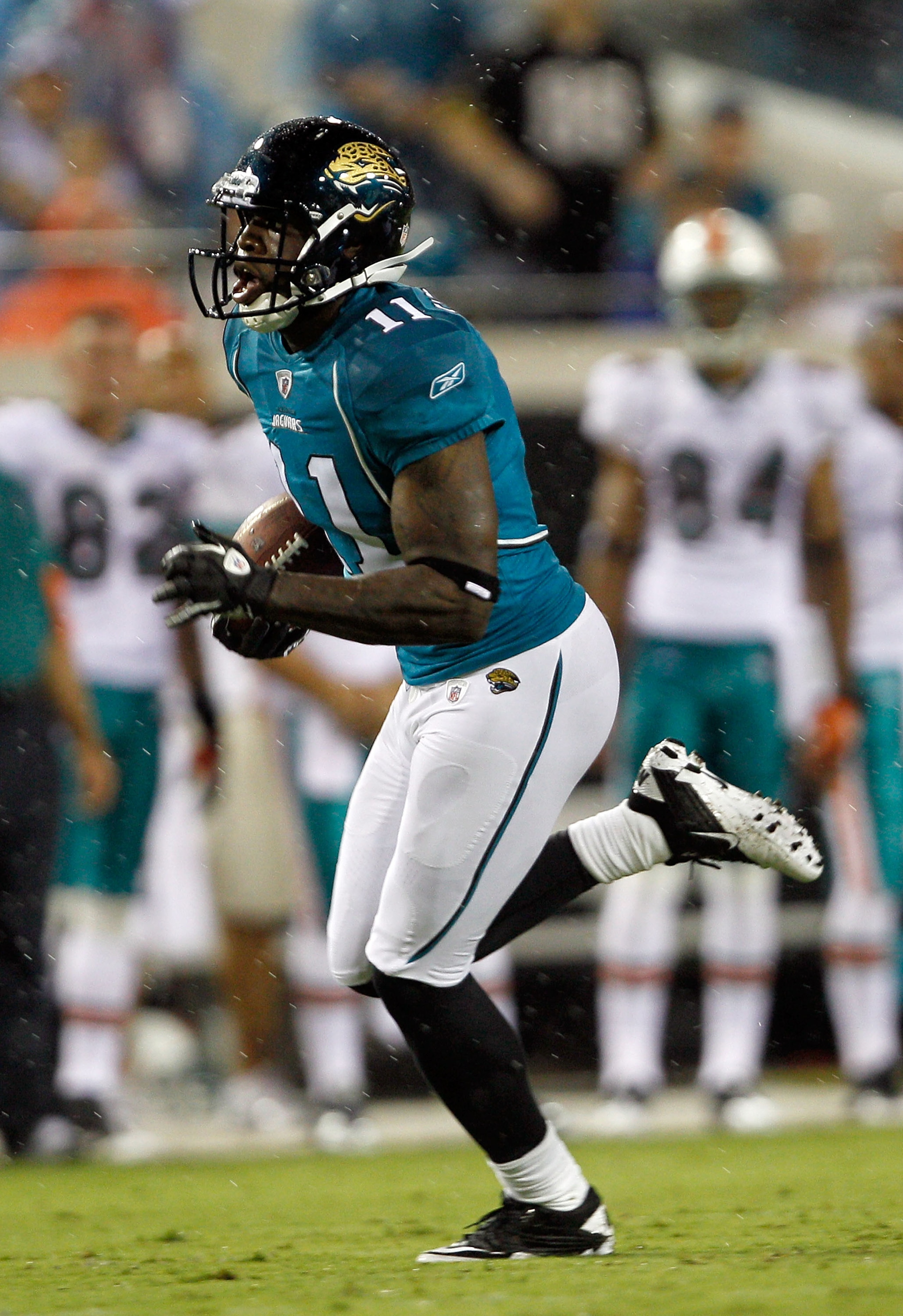 JACKSONVILLE, FL - AUGUST 21:  Mike Sims-Walker #11 of the Jacksonville Jaguars runs after making a reception during the preseason game against the Miami Dolphins at EverBank Field on August 21, 2010 in Jacksonville, Florida.  (Photo by Sam Greenwood/Gett