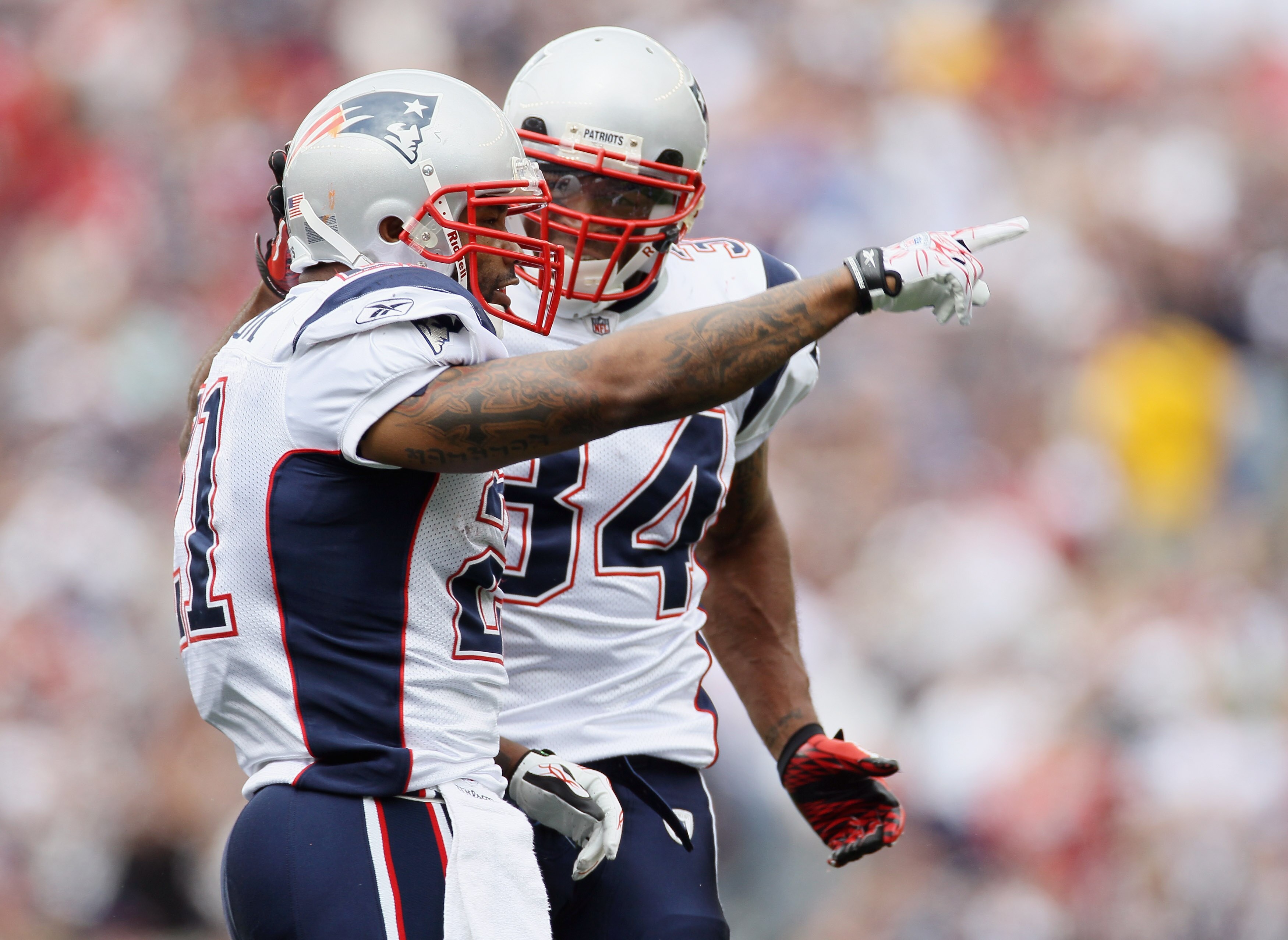 FOXBORO, MA - SEPTEMBER 12: Fred Taylor #21 of the New England Patriots celebrates his run with teammate Sammy Morris #34 in the first half against the Cincinnati Bengals during the NFL season opener on September 12, 2010 at Gillette Stadium in Foxboro, FOXBORO, MA - SEPTEMBER 12: Fred Taylor #21 of the New England Patriots celebrates his run with teammate Sammy Morris #34 in the first half against the Cincinnati Bengals during the NFL season opener on September 12, 2010 at Gillette Stadium in Foxboro,