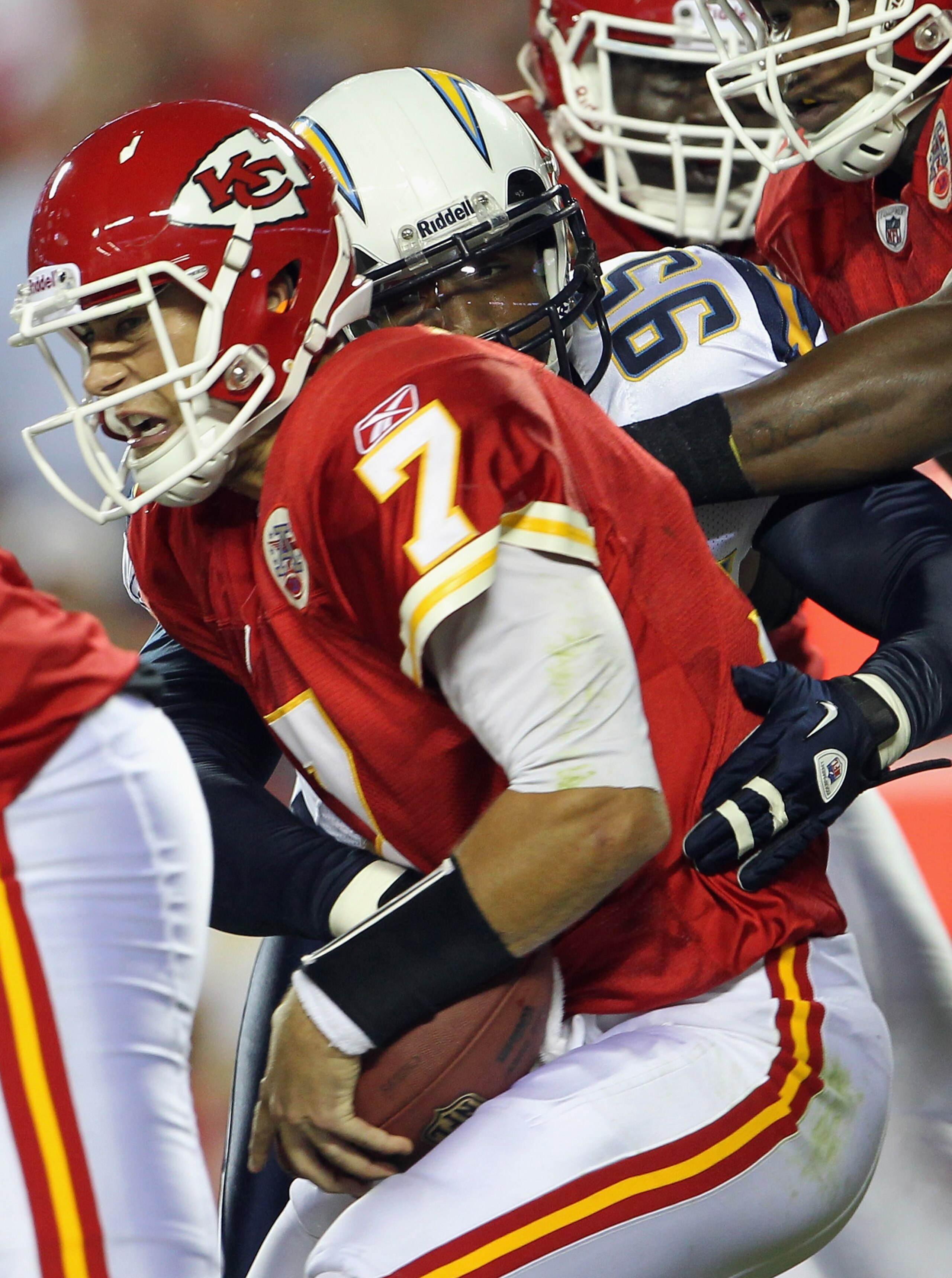 KANSAS CITY, MO - SEPTEMBER 13:  Quarterback Matt Cassel #7 of the Kansas City Chiefs is sacked by Shaun Phillips #95 of the San Diego Chargers during the 1st quarter of the game against on September 13, 2010 at Arrowhead Stadium in Kansas City, Missouri.