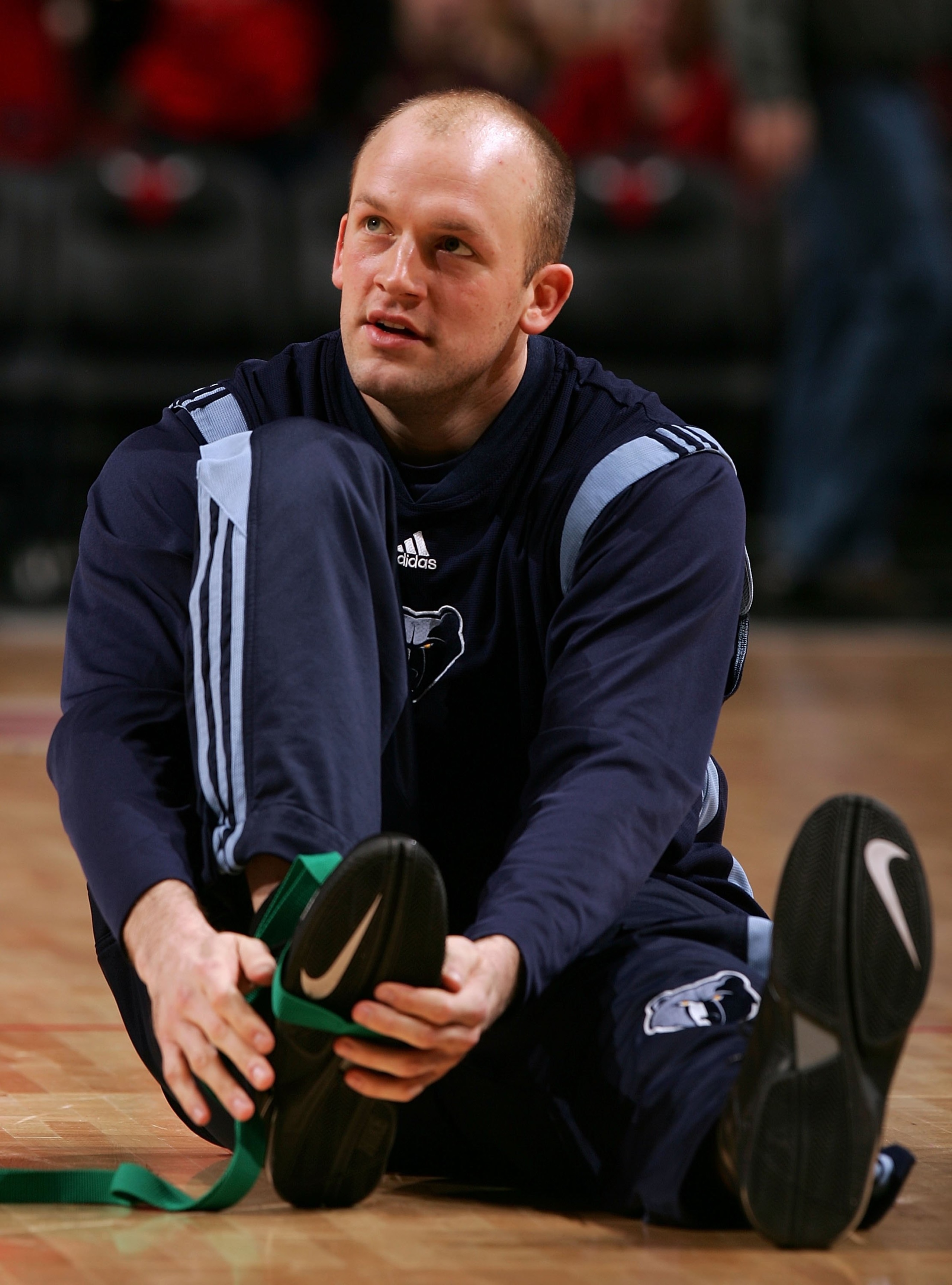 CHICAGO - JANUARY 13: Brian Cardinal #35 of the Memphis Grizzlies stretches during warm-ups against the Chicago Bulls January 13, 2007 at the United Center in Chicago, Illinois. The Bulls won 111-66. NOTE TO USER: User expressly acknowledges and agrees t CHICAGO - JANUARY 13: Brian Cardinal #35 of the Memphis Grizzlies stretches during warm-ups against the Chicago Bulls January 13, 2007 at the United Center in Chicago, Illinois. The Bulls won 111-66. NOTE TO USER: User expressly acknowledges and agrees t