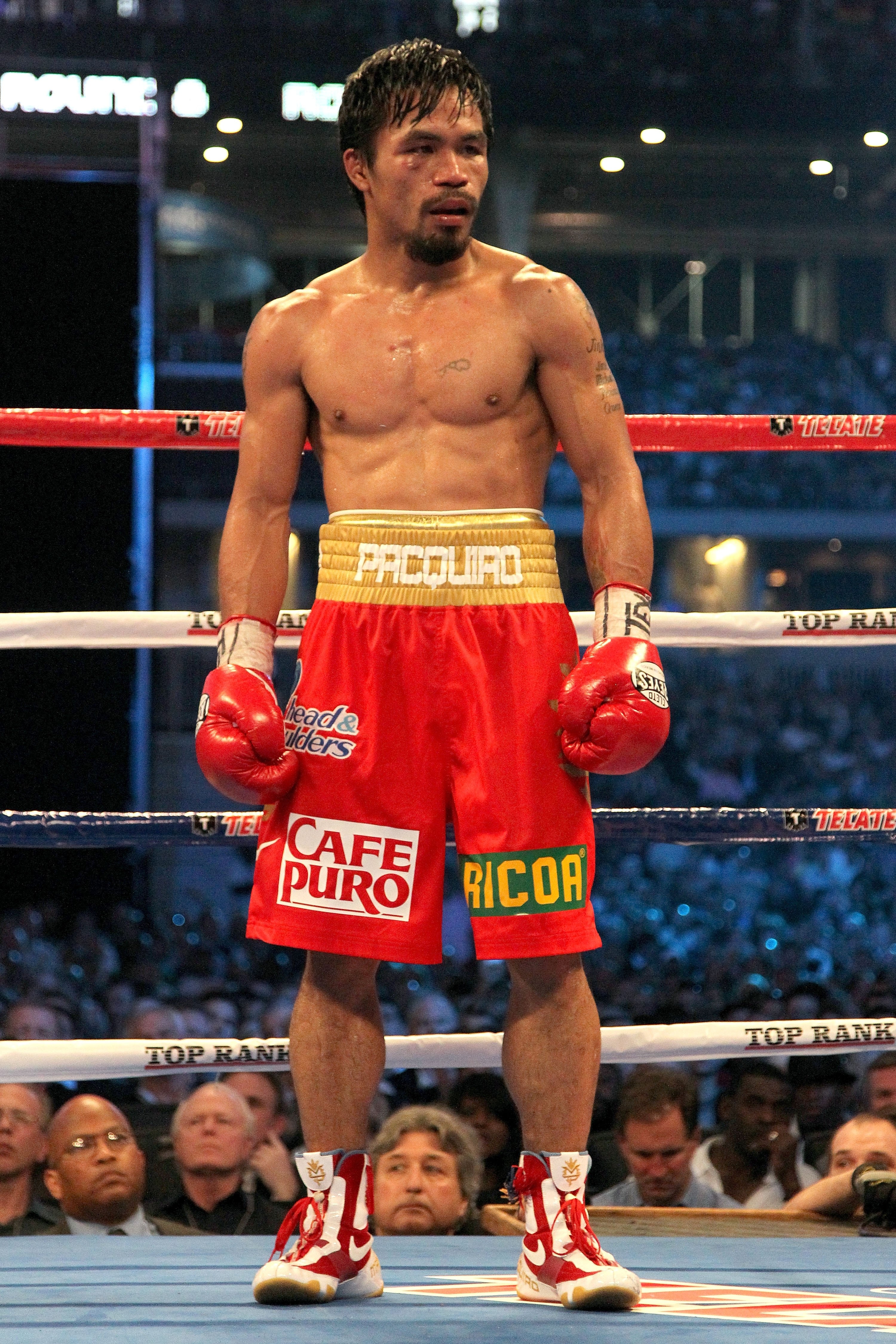 ARLINGTON, TX - MARCH 13:  Manny Pacquiao of the Philippines looks on in the ring against Joshua Clottey of Ghana during the WBO welterweight title fight at Cowboys Stadium on March 13, 2010 in Arlington, Texas. Pacquiao defeated Clottey by unanimous deci