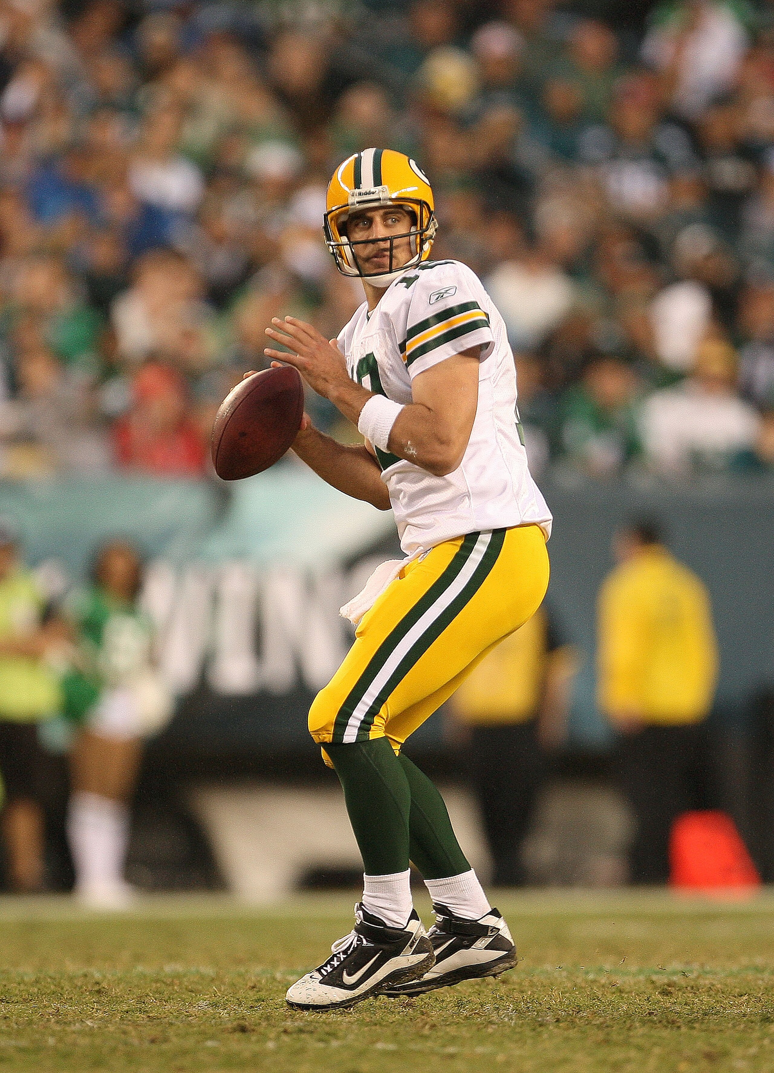 PHILADELPHIA - SEPTEMBER 12:  Aaron Rodgers #12 of the Green Bay Packers looks to pass during a game against the Philadelphia Eagles at Lincoln Financial Field on September 12, 2010 in Philadelphia, Pennsylvania.  (Photo by Mike Ehrmann/Getty Images)