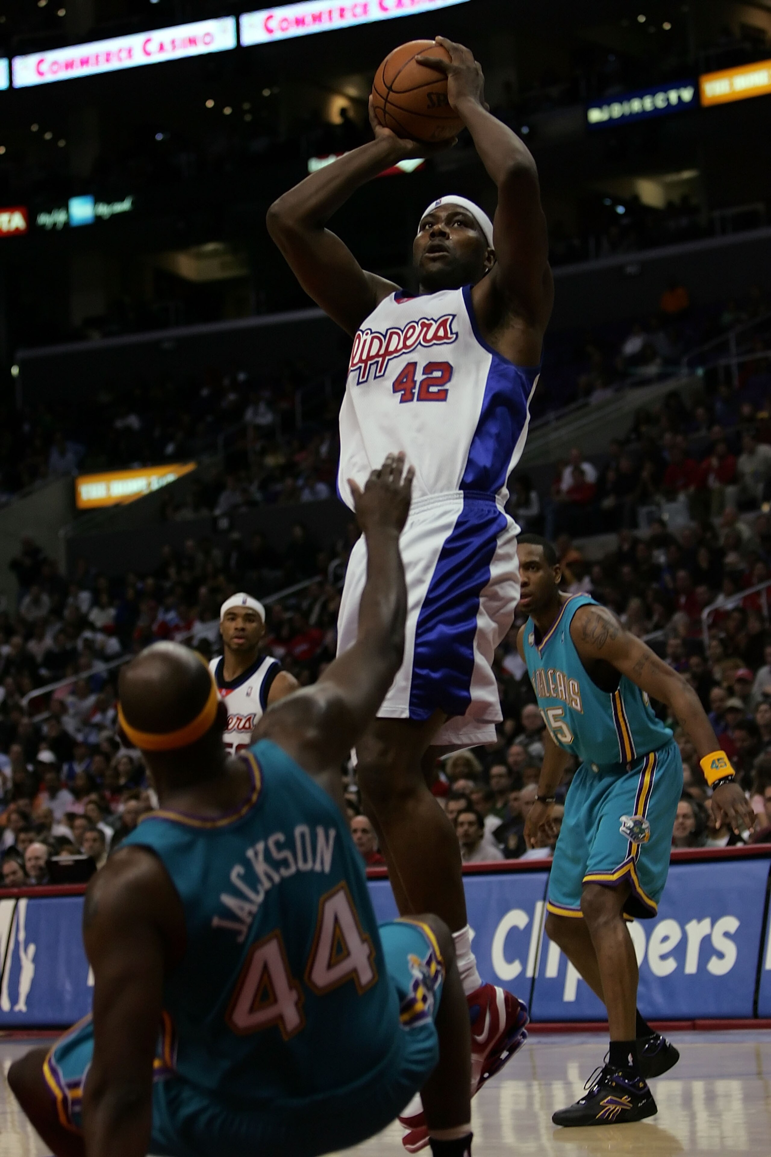 LOS ANGELES, CA - APRIL 18: Elton Brand #42 of the Los Angeles Clippers goes up for a shot in the lane as he crashes into Marc Jackson #44 of the New Orleans/Oklahoma City Hornets in the second half at Staples Center on April 18, 2007 in Los Angeles, Cal LOS ANGELES, CA - APRIL 18: Elton Brand #42 of the Los Angeles Clippers goes up for a shot in the lane as he crashes into Marc Jackson #44 of the New Orleans/Oklahoma City Hornets in the second half at Staples Center on April 18, 2007 in Los Angeles, Cal