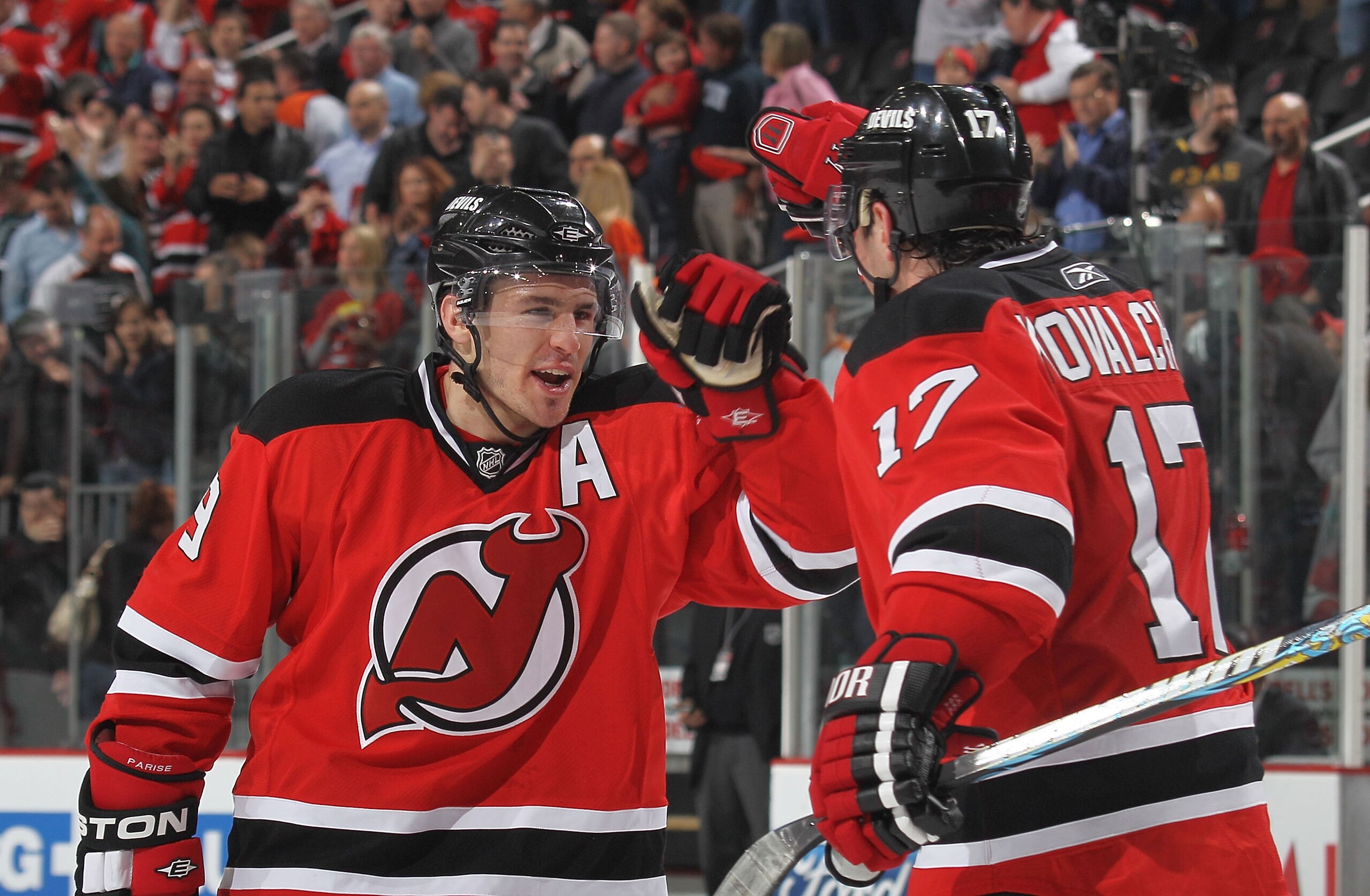NEWARK, NJ - APRIL 16: Zach Parise #9 and Ilya Kovachuk #17 of the New Jersey Devils celebrate their 5-3 victory over the Philadelphia Flyers in Game Two of the Eastern Conference Quarterfinals during the 2010 NHL Stanley Cup Playoffs at the Prudential Ce NEWARK, NJ - APRIL 16: Zach Parise #9 and Ilya Kovachuk #17 of the New Jersey Devils celebrate their 5-3 victory over the Philadelphia Flyers in Game Two of the Eastern Conference Quarterfinals during the 2010 NHL Stanley Cup Playoffs at the Prudential Ce
