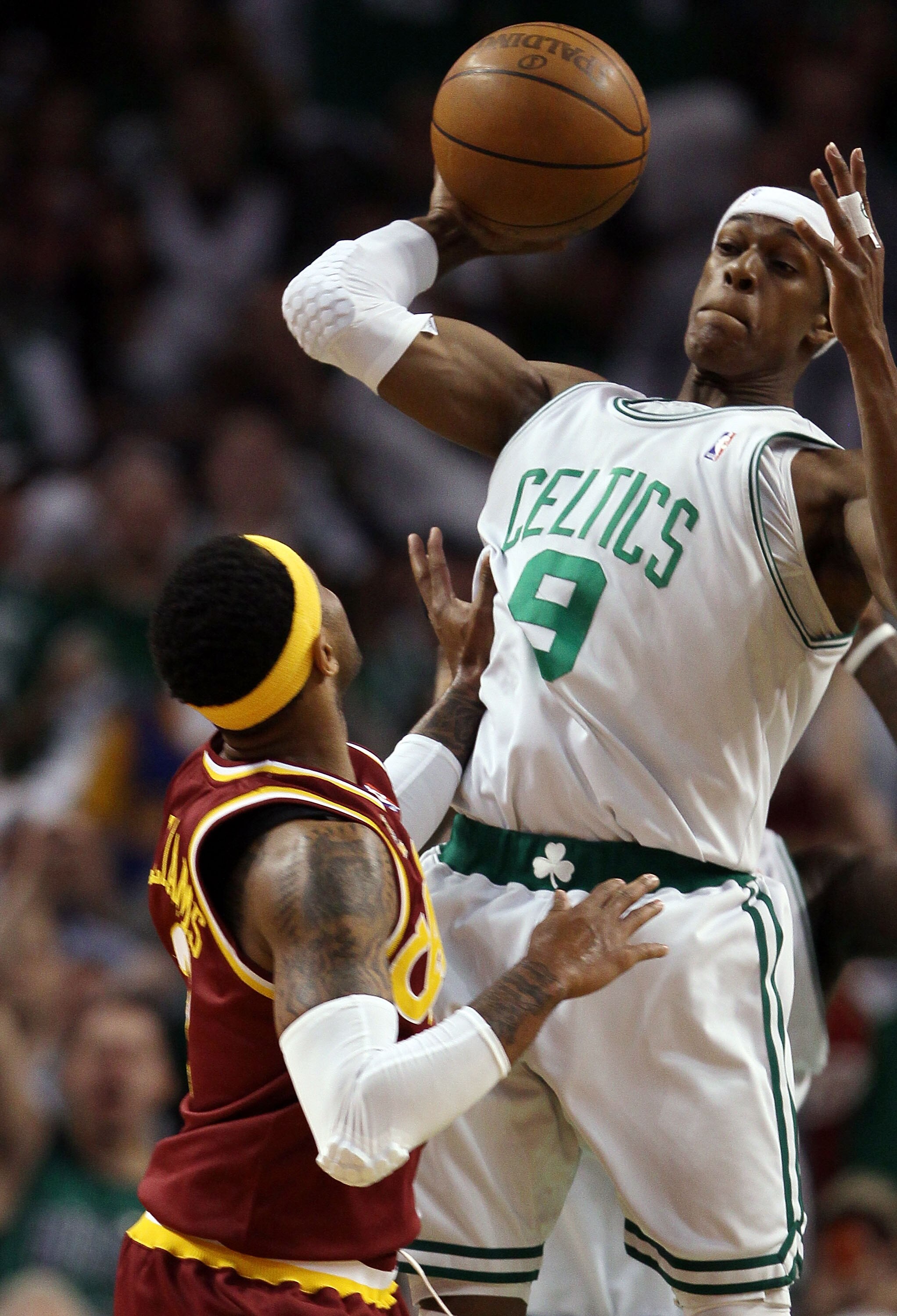 BOSTON - MAY 09:  Rajon Rondo #9 of the Boston Celtics passes the ball as Mo Williams #2 of the Cleveland Cavaliers defends during Game Four of the Eastern Conference Semifinals of the 2010 NBA playoffs at TD Garden on May 9, 2010 in Boston, Massachusetts
