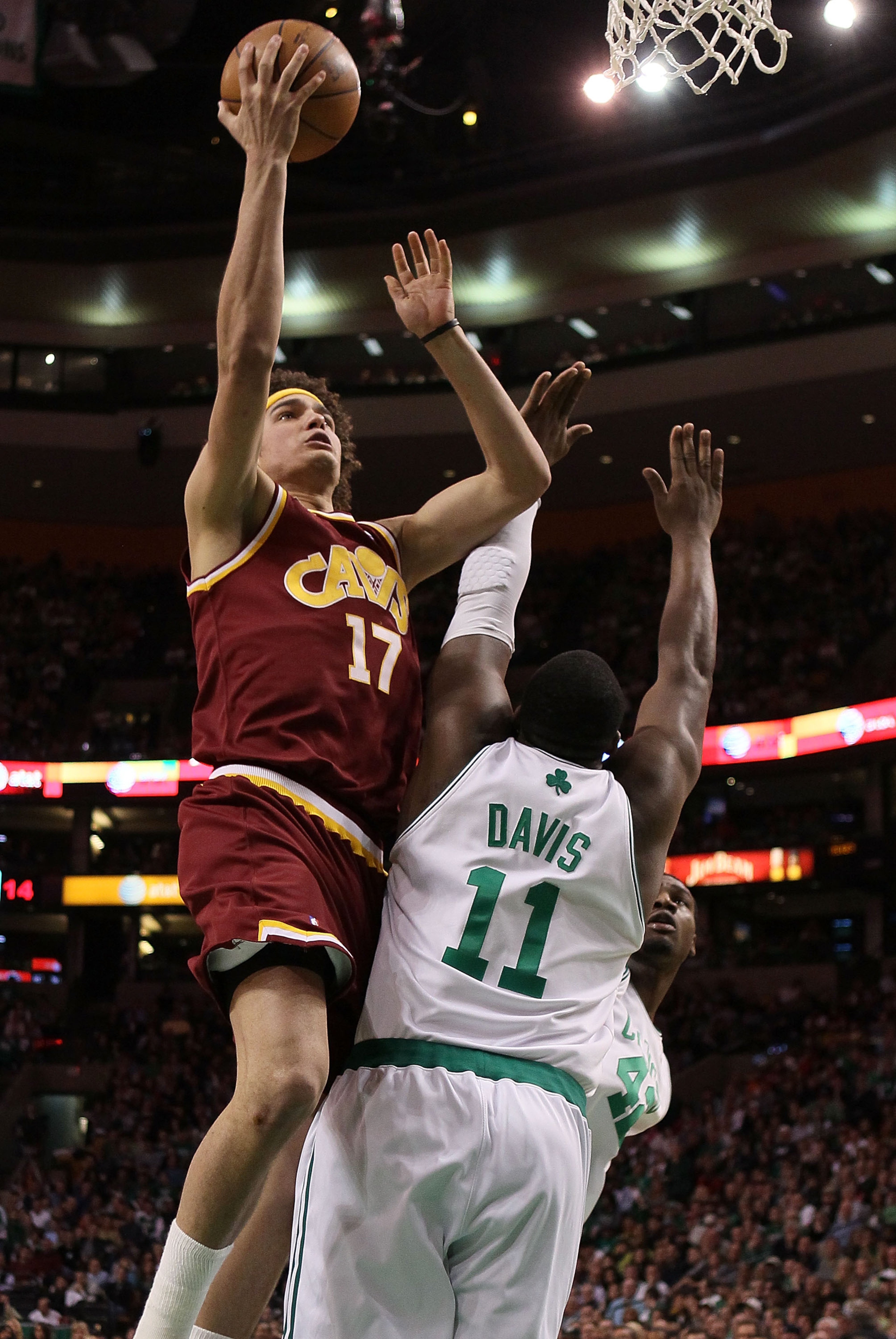 BOSTON - MAY 09:  Anderson Varejao #17 of the Cleveland Cavaliers heads for the basket as Glen Davis #11 of the Boston Celtics defends during Game Four of the Eastern Conference Semifinals of the 2010 NBA playoffs at TD Garden on May 9, 2010 in Boston, Ma