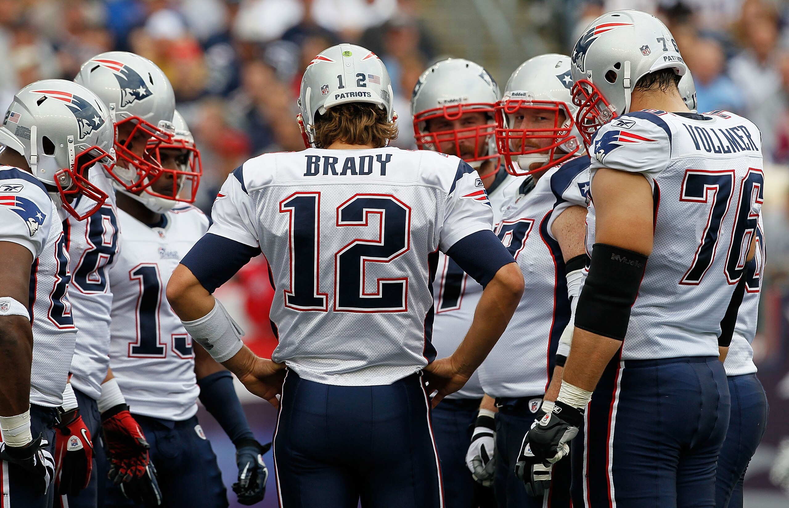 FOXBORO, MA - SEPTEMBER 12: Quarterback Tom Brady #12  of the New England Patriots hurdles with the offense during the NFL season opener against the Cincinnati Bengals at Gillette Stadium on September 12, 2010 in Foxboro, Massachusetts. (Photo by Jim Roga