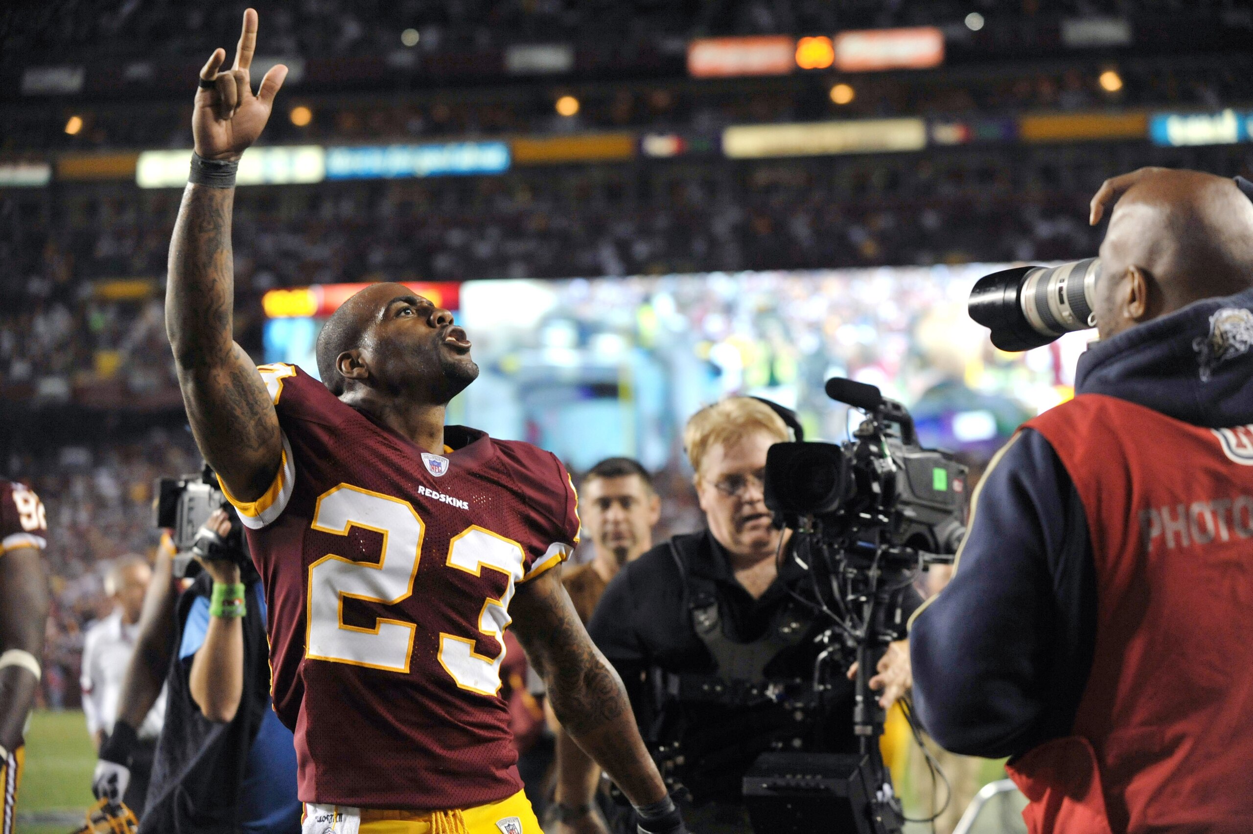 LANDOVER, MD - SEPTEMBER 12:  DeAngelo Hall #23 of the Washington Redskins celebrates his touchdown during the NFL season opener against the Dallas Cowboys at FedExField on September 12, 2010 in Landover, Maryland. The Redskins lead the Cowboys 10-3 at ha