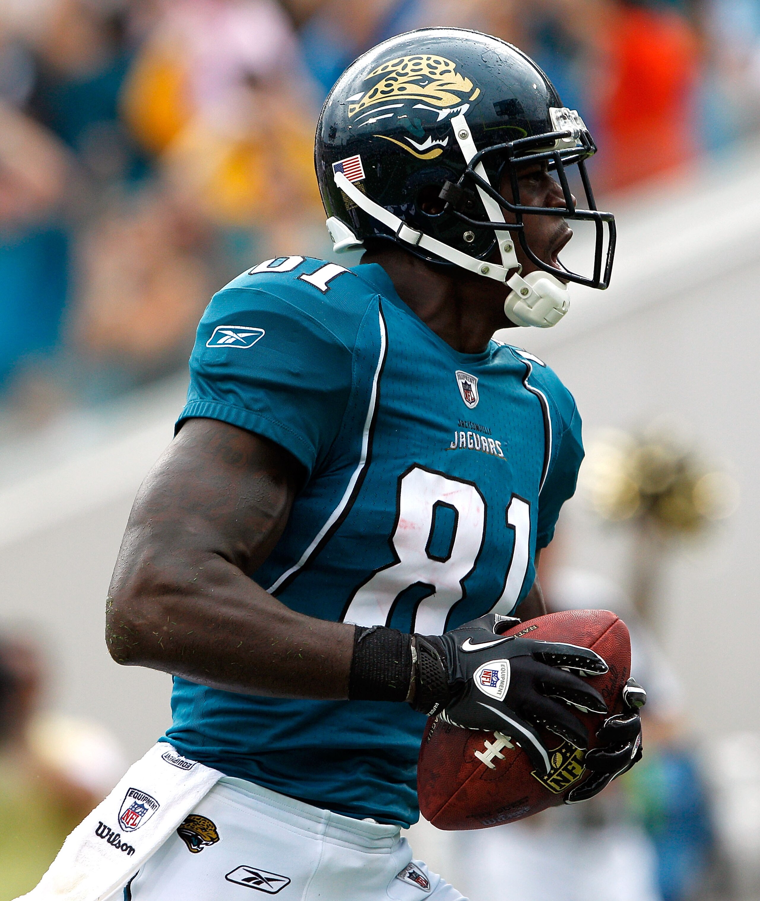 JACKSONVILLE, FL - SEPTEMBER 12:  Kassim Osgood #81 of the Jacksonville Jaguars celebrates a touchdown reception during the NFL season opener game against the Denver Broncos at EverBank Field on September 12, 2010 in Jacksonville, Florida.  (Photo by Sam 