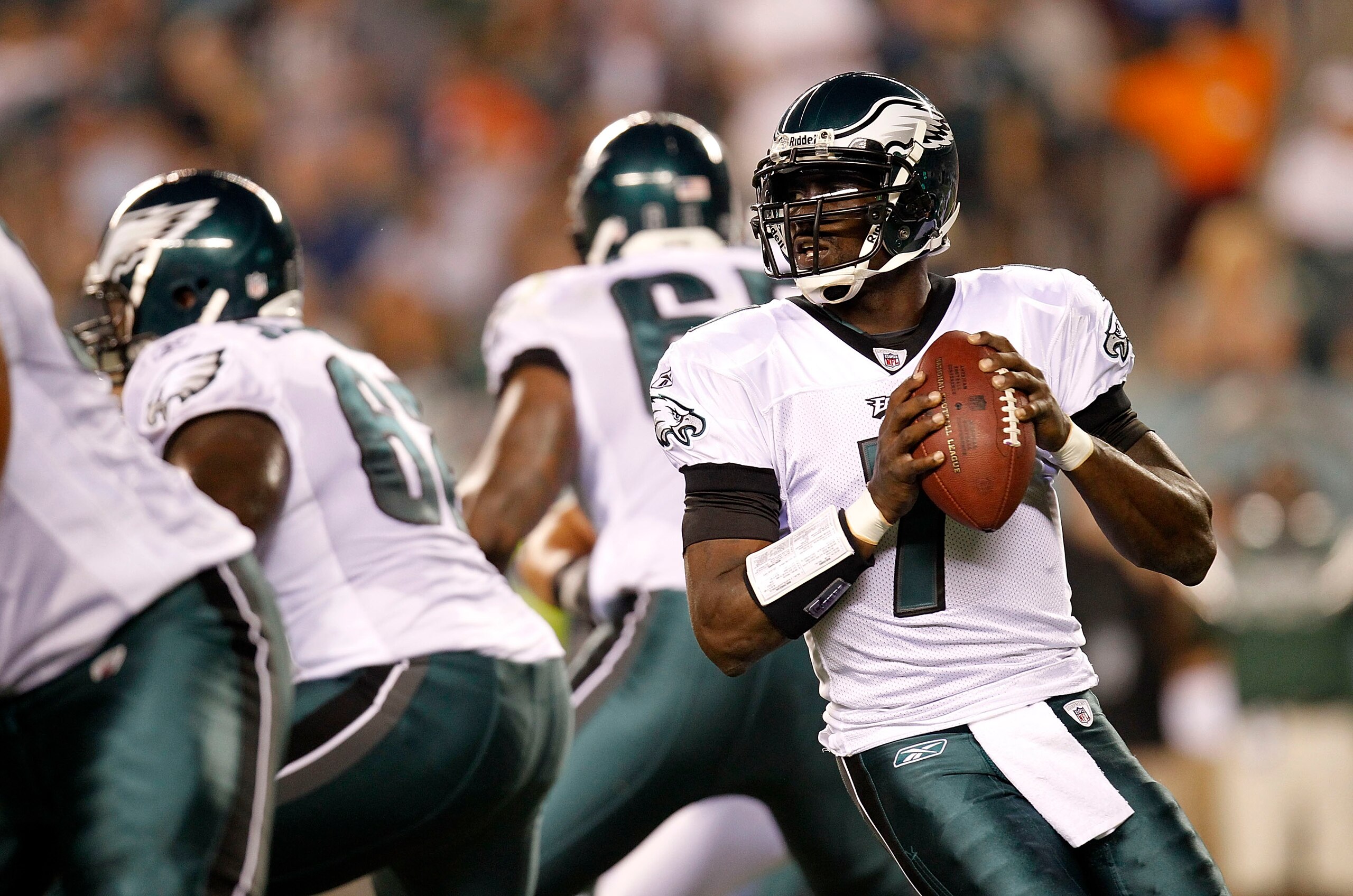 PHILADELPHIA - SEPTEMBER 02:  Michael Vick #7 of the Philadelphia Eagles drops back to pass during a preseason game against the New York Jets at Lincoln Financial Field on September 2, 2010 in Philadelphia, Pennsylvania.  (Photo by Jeff Zelevansky/Getty I