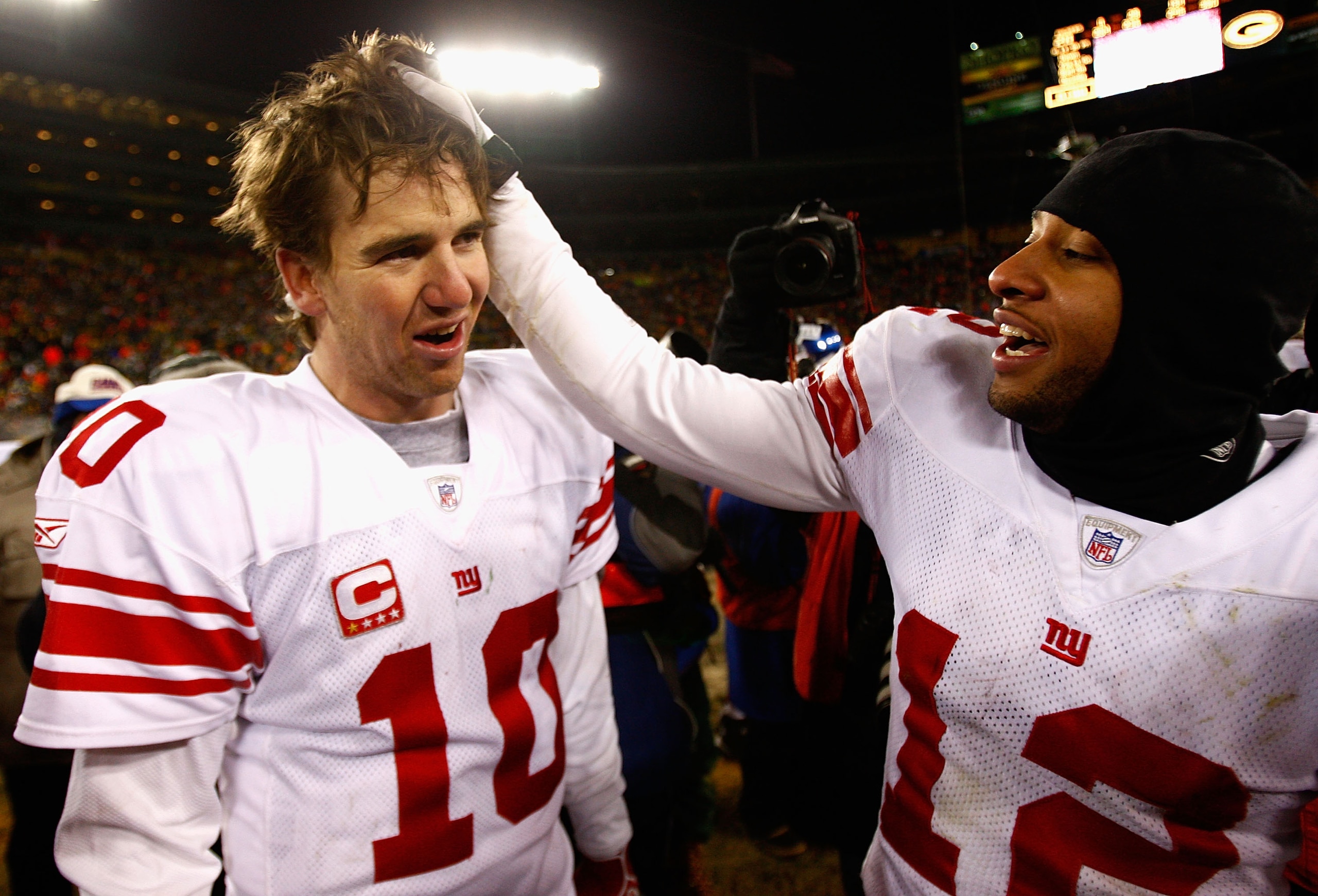GREEN BAY, WI - JANUARY 20:  Quarterback Eli Manning #10 of the New York Giants celebrates with Steve Smith #12 after winning the NFC championship game against the Green Bay Packers on January 20, 2008 at Lambeau Field in Green Bay, Wisconsin.   The Giant