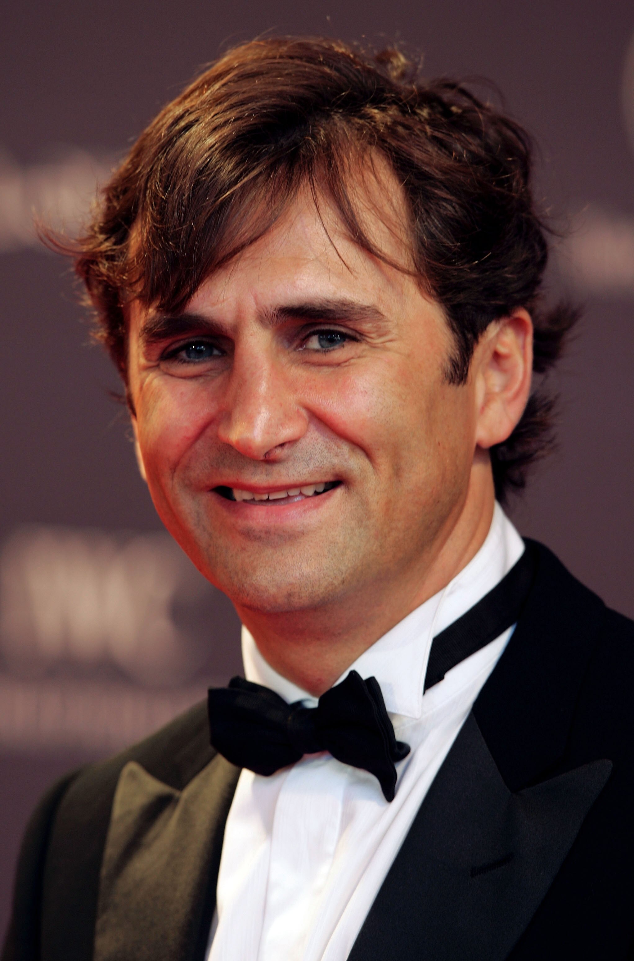 ESTORIL, PORTUGAL - MAY 16:  Motor racing driver Alex Zanardi arrives at the Laureus World Sports Awards May 16, 2005 at the Estoril Casino, Estoril, Portugal.  (Photo by Clive Rose/Getty Images for Laureus)