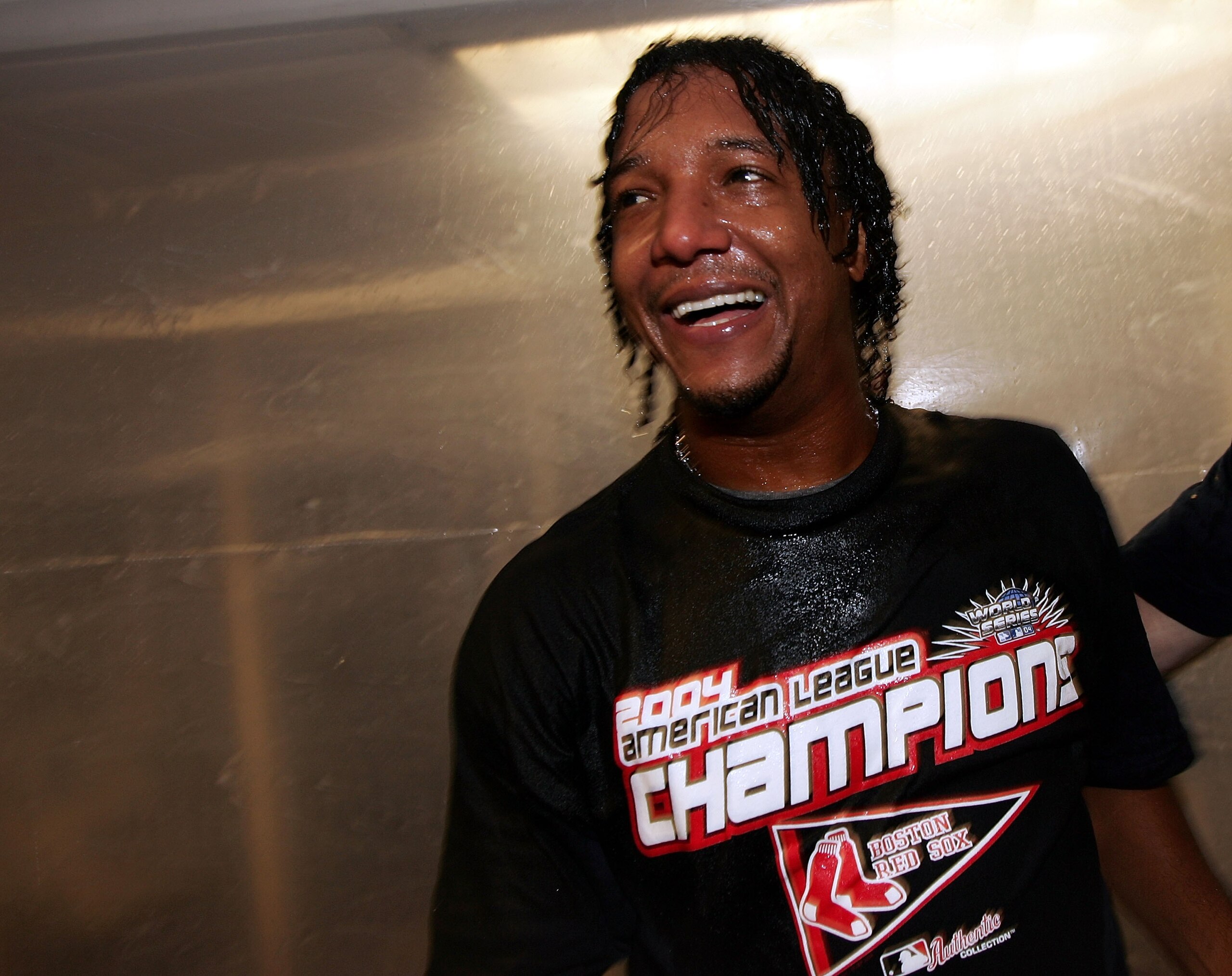 NEW YORK - OCTOBER 20: Pedro Martinez #45 of the Boston Red Sox celebrate after defeating the New York Yankees 10-3 to win game seven of the American League Championship Series on October 20, 2004 at Yankee Stadium in the Bronx borough of New York City. NEW YORK - OCTOBER 20: Pedro Martinez #45 of the Boston Red Sox celebrate after defeating the New York Yankees 10-3 to win game seven of the American League Championship Series on October 20, 2004 at Yankee Stadium in the Bronx borough of New York City.