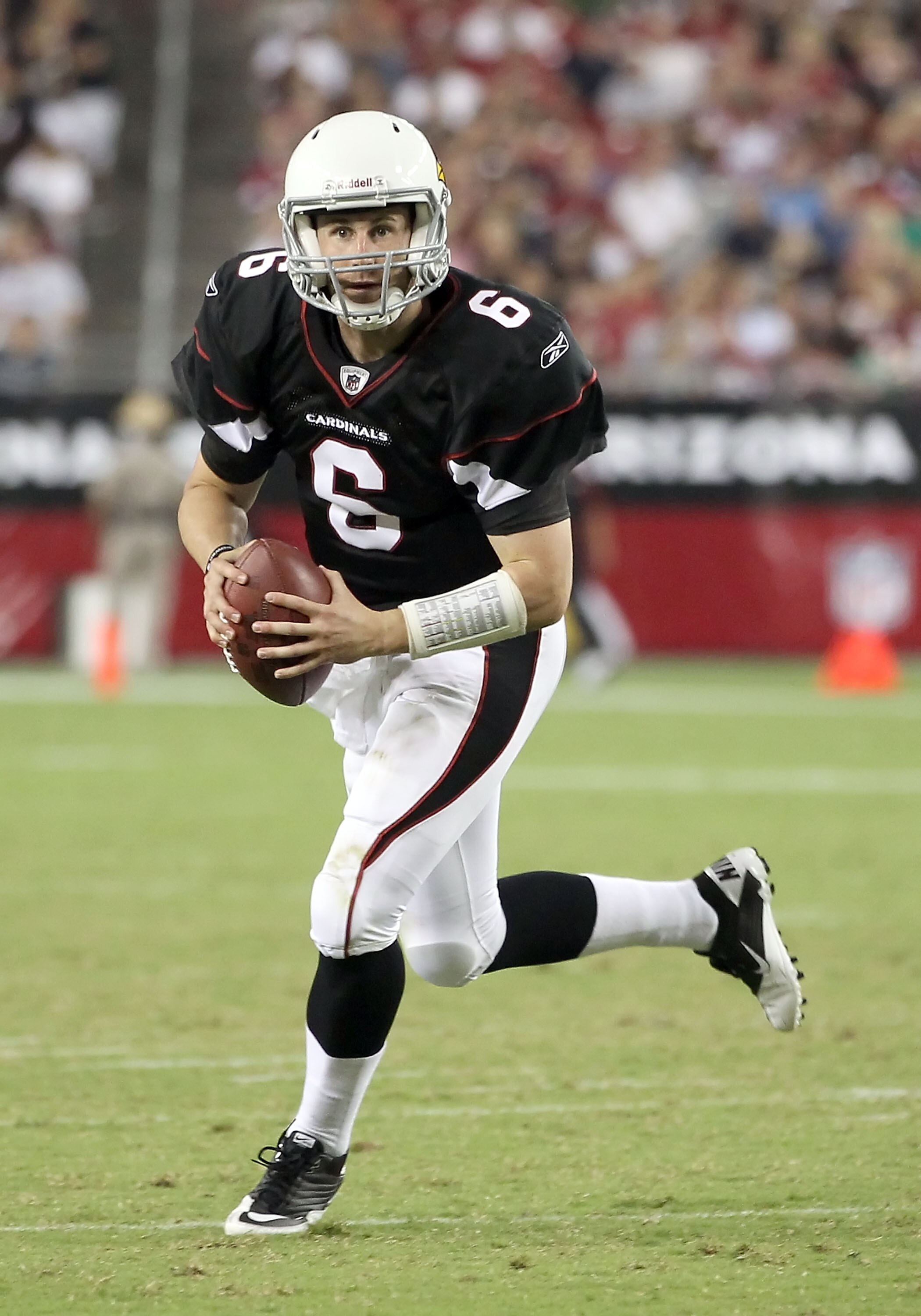 GLENDALE, AZ - SEPTEMBER 02:  Quarterback Max Hall #6 of the Arizona Cardinals scrambles for a 6 yard touchdown against the Washington Redskins during the third quarter of the preseason NFL game at the University of Phoenix Stadium on September 2, 2010 in