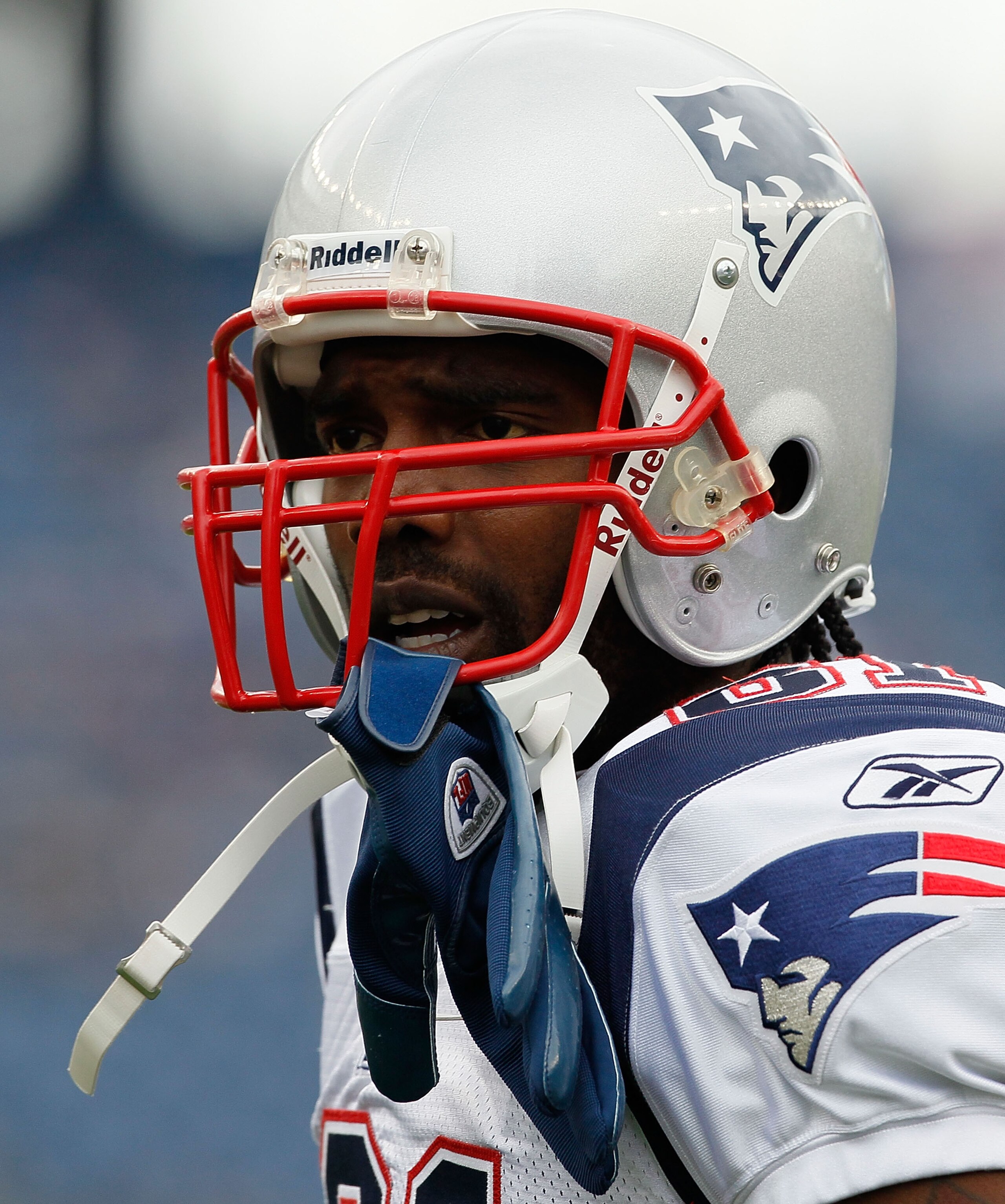 FOXBORO, MA - SEPTEMBER 12: Randy Moss #81 of the New England Patriots looks for a signal before the NFL season opener against the Cincinnati Bengals at Gillette Stadium on September 12, 2010 in Foxboro, Massachusetts. (Photo by Jim Rogash/Getty Images)