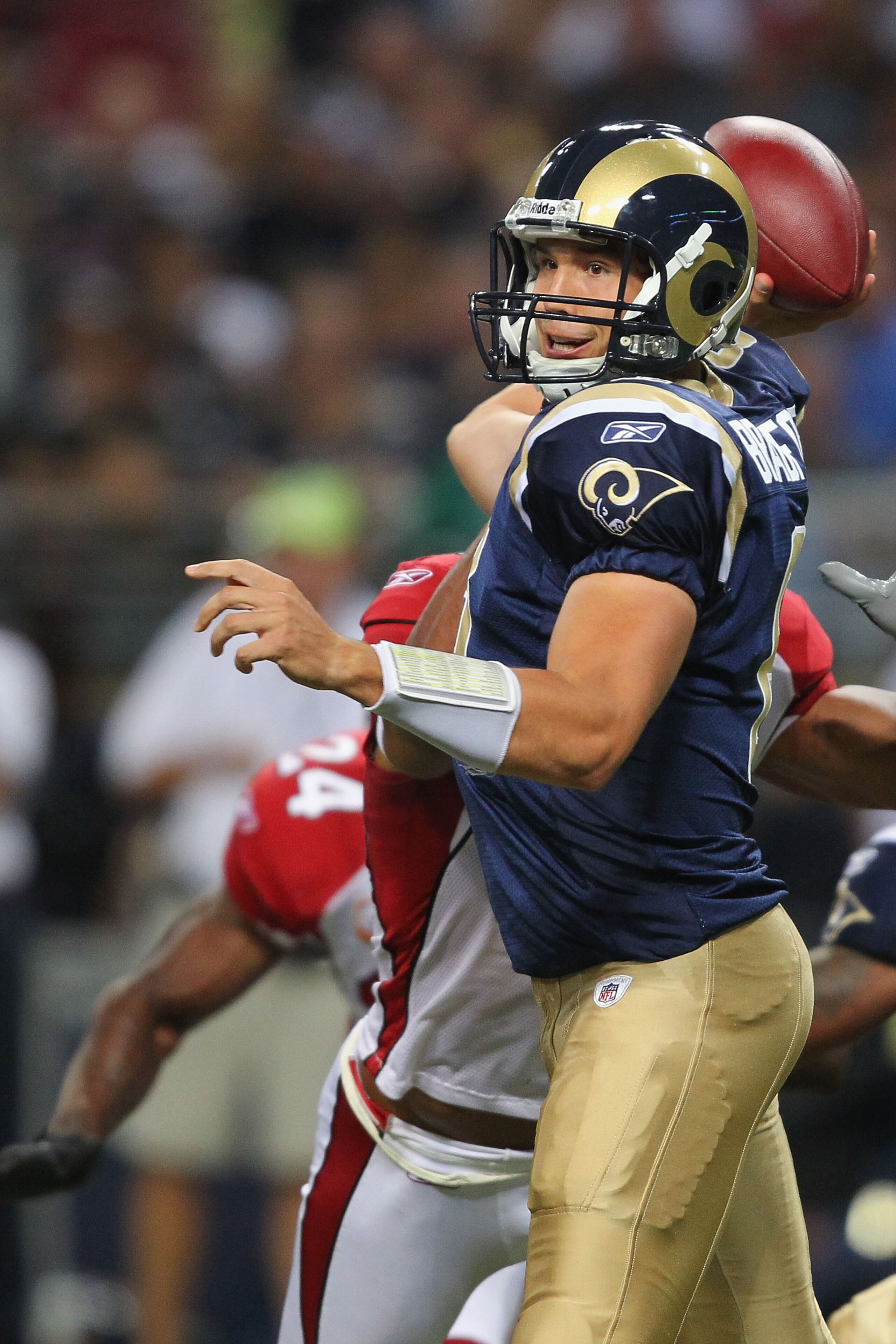 ST. LOUIS - SEPTEMBER 12: Sam Bradford #8 of the St. Louis Rams passes against the Arizona Cardinals during the NFL season opener at the Edward Jones Dome on September 12, 2010 in St. Louis, Missouri.  The Cardinals beat the Rams 17-13.  (Photo by Dilip V
