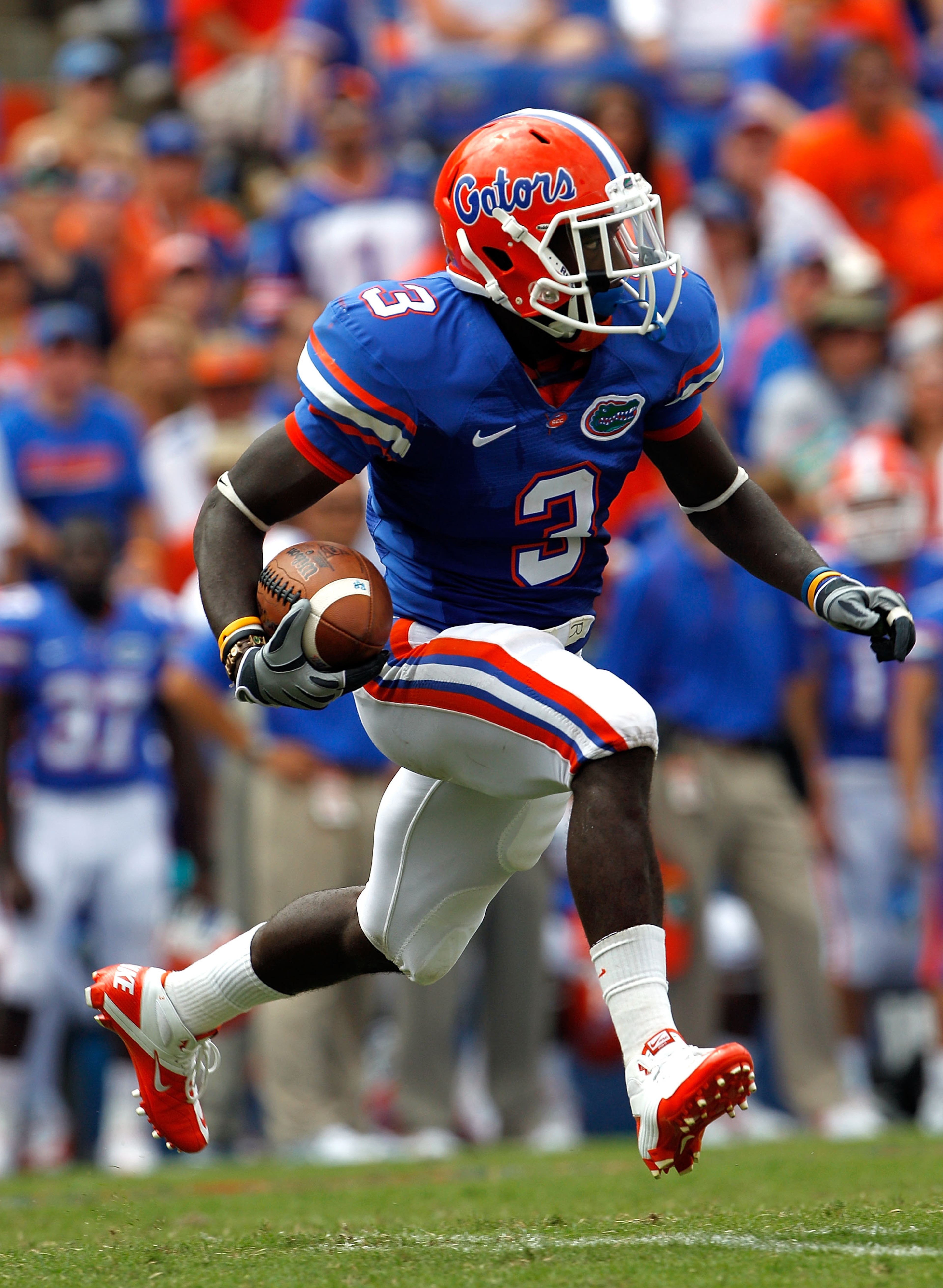 GAINESVILLE, FL - SEPTEMBER 04:  Chris Rainey #3 of the Florida Gators runs after making a reception against the Miami University RedHawks at Ben Hill Griffin Stadium on September 4, 2010 in Gainesville, Florida. Florida beat Miami 34-12.  (Photo by Sam G