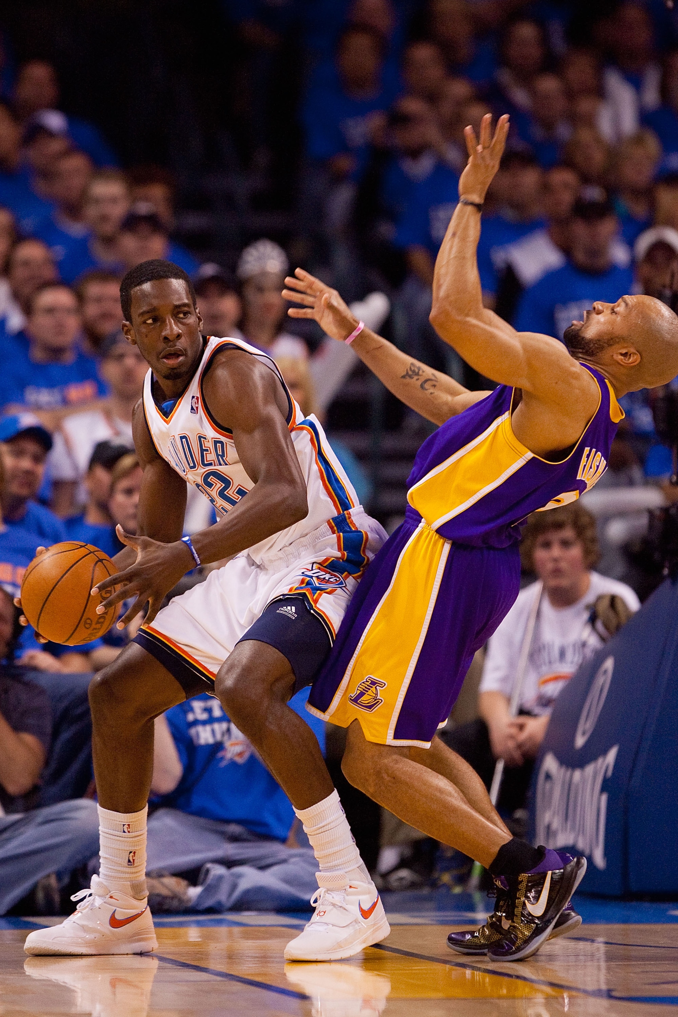 OKLAHOMA CITY - APRIL 30: Jeff Green #22 of the Oklahoma City Thunder looks to pass the ball against Derek Fisher #2 of the Los Angeles Lakers during Game Six of the Western Conference Quarterfinals of the 2010 NBA Playoffs on April 30, 2010 at the Ford C