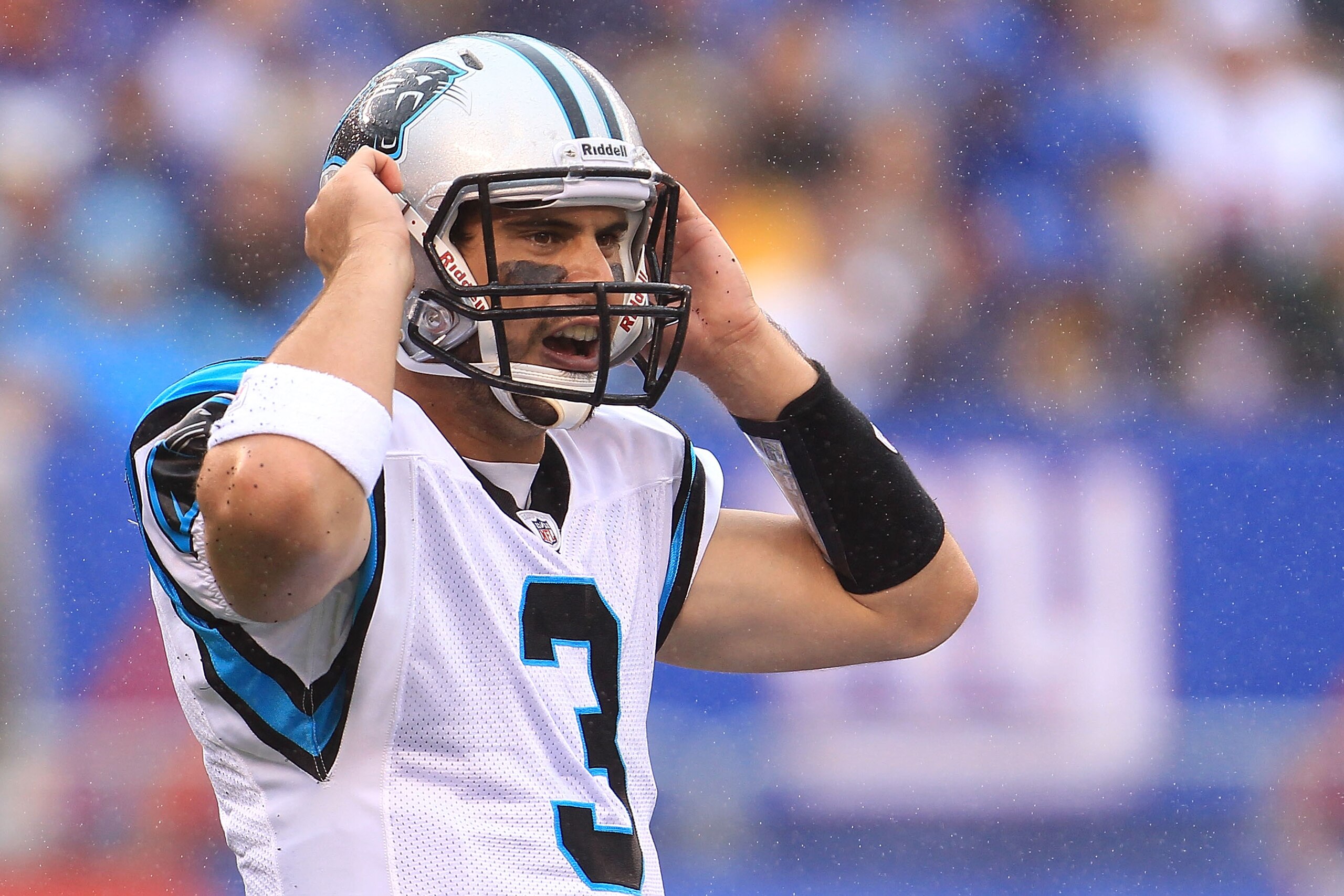 EAST RUTHERFORD, NJ - SEPTEMBER 12:  Matt Moore #3 of the Carolina Panthers gives instructions against the New York Giants during the NFL season opener at New Meadowlands Stadium on September 12, 2010 in East Rutherford, New Jersey.  (Photo by Chris McGra