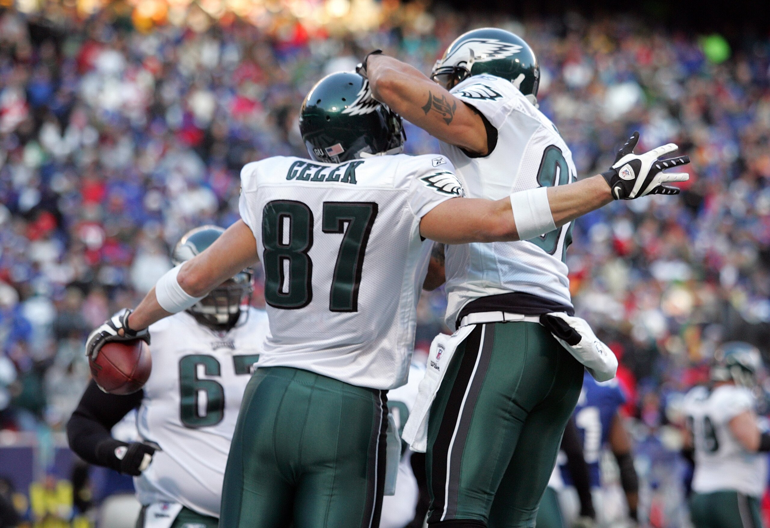 EAST RUTHERFORD, NJ - JANUARY 11:  Brent Celek #87 of the Philadelphia Eagles celebrates with a teammate during the NFC Divisional Playoff Game against the New York Giants on January 11, 2009 at Giants Stadium in East Rutherford, New Jersey. The Eagles de