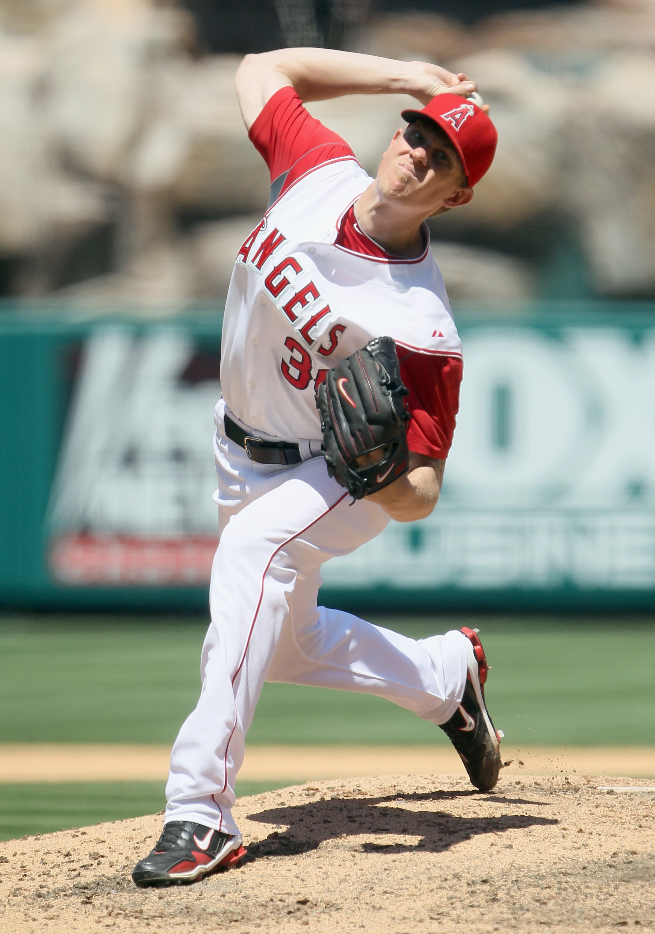 ANAHEIM, CA - AUGUST 11:  Jered Weaver #36 of the Los Angeles Angels of Anaheim pitches against the Kansas City Royals in the sixth inning at Angel Stadium on August 11, 2010 in Anaheim, California.  The Angels defeated the Royals 2-1 in ten innings.  (Ph