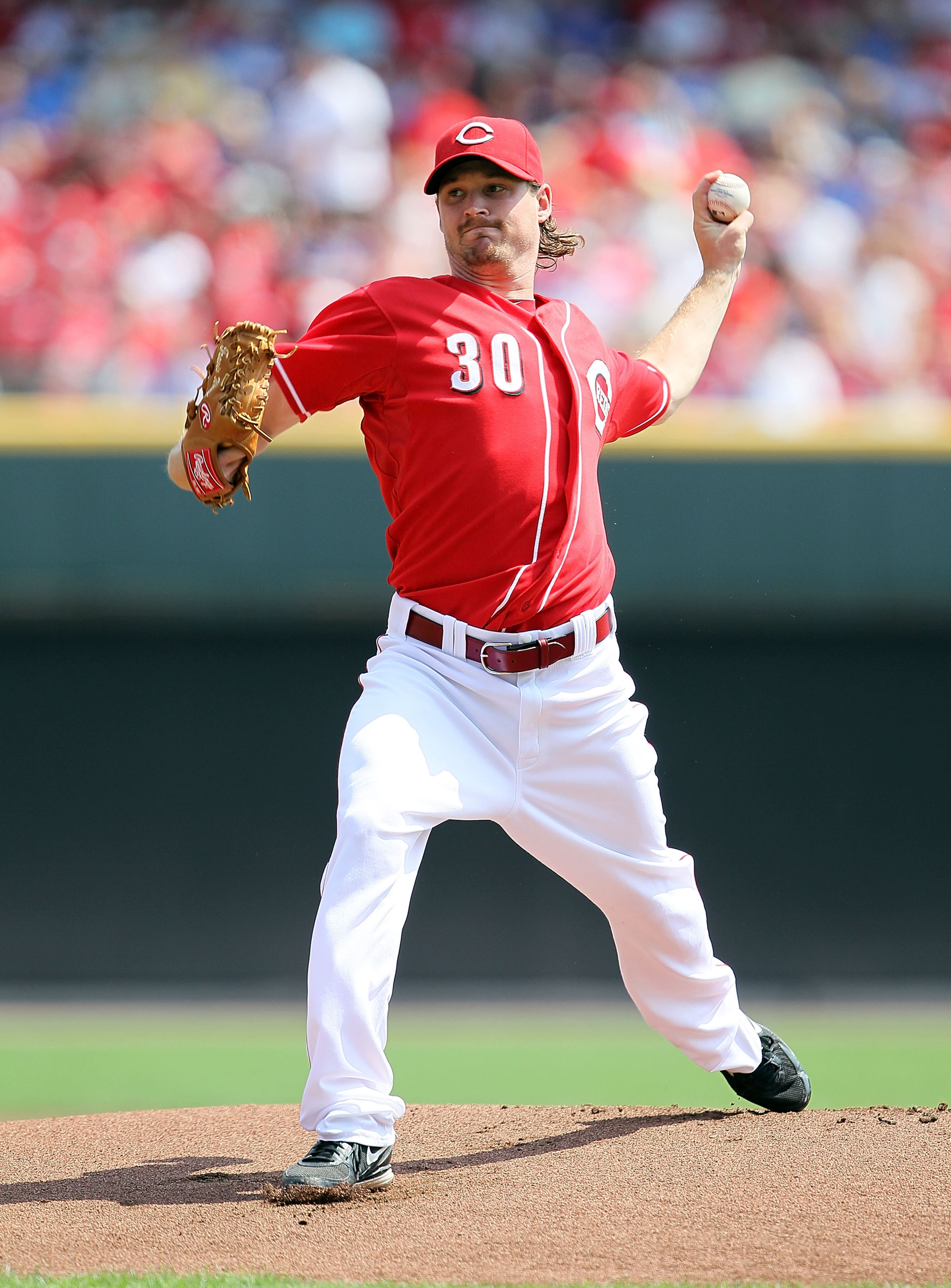 CINCINNATI - AUGUST 29:  Travis Wood #30 of the Cincinnati Reds throws a pitch during the game against the Chicago Cubs at Great American Ball Park on August 29, 2010 in Cincinnati, Ohio.  (Photo by Andy Lyons/Getty Images)