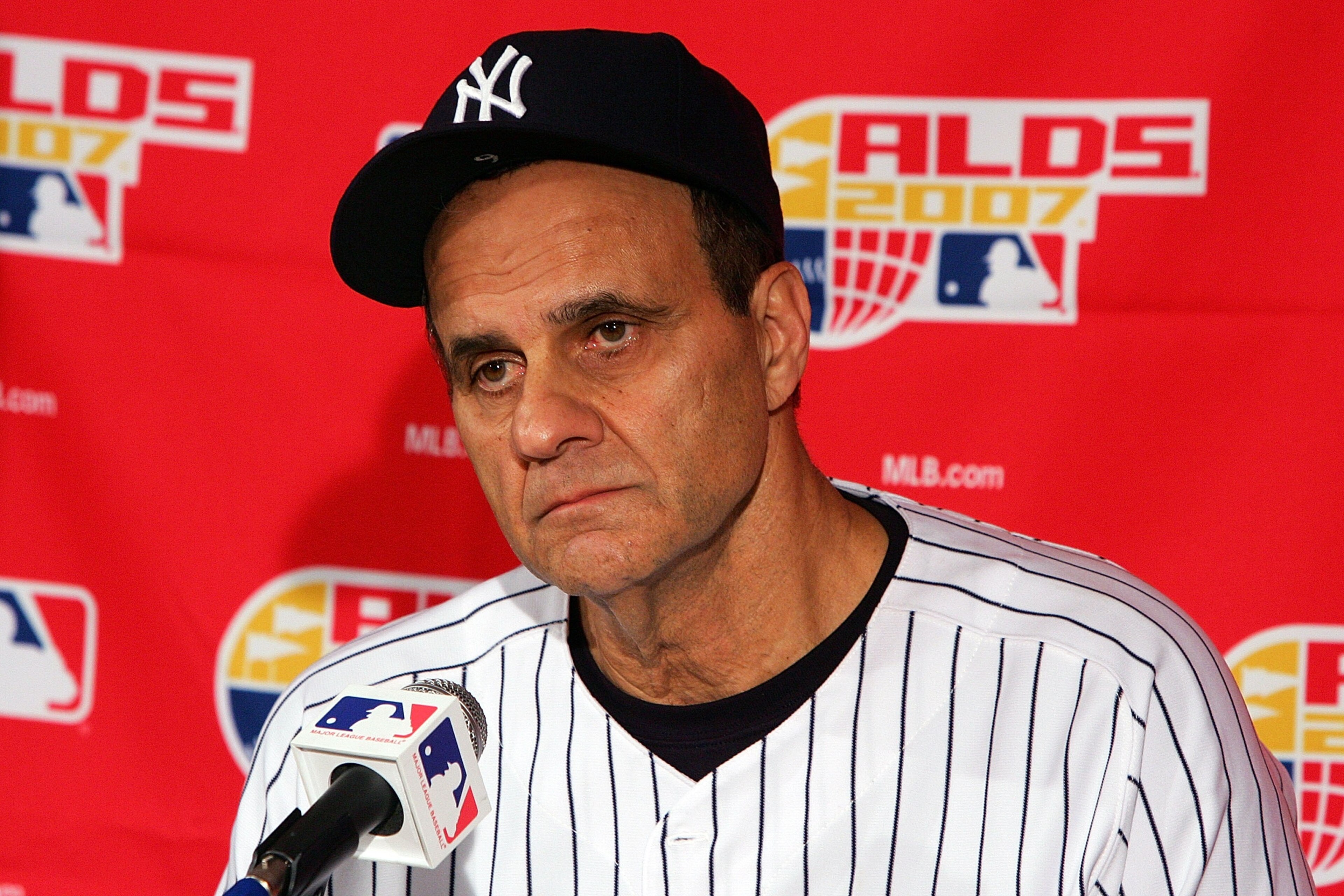 NEW YORK - OCTOBER 08: Manager Joe Torre #6 of the New York Yankees talks to the media after losing against the Cleveland Indians in the American League Division Series by the score of 6-4 at Yankee Stadium on October 8, 2007 in the Bronx borough of New NEW YORK - OCTOBER 08: Manager Joe Torre #6 of the New York Yankees talks to the media after losing against the Cleveland Indians in the American League Division Series by the score of 6-4 at Yankee Stadium on October 8, 2007 in the Bronx borough of New