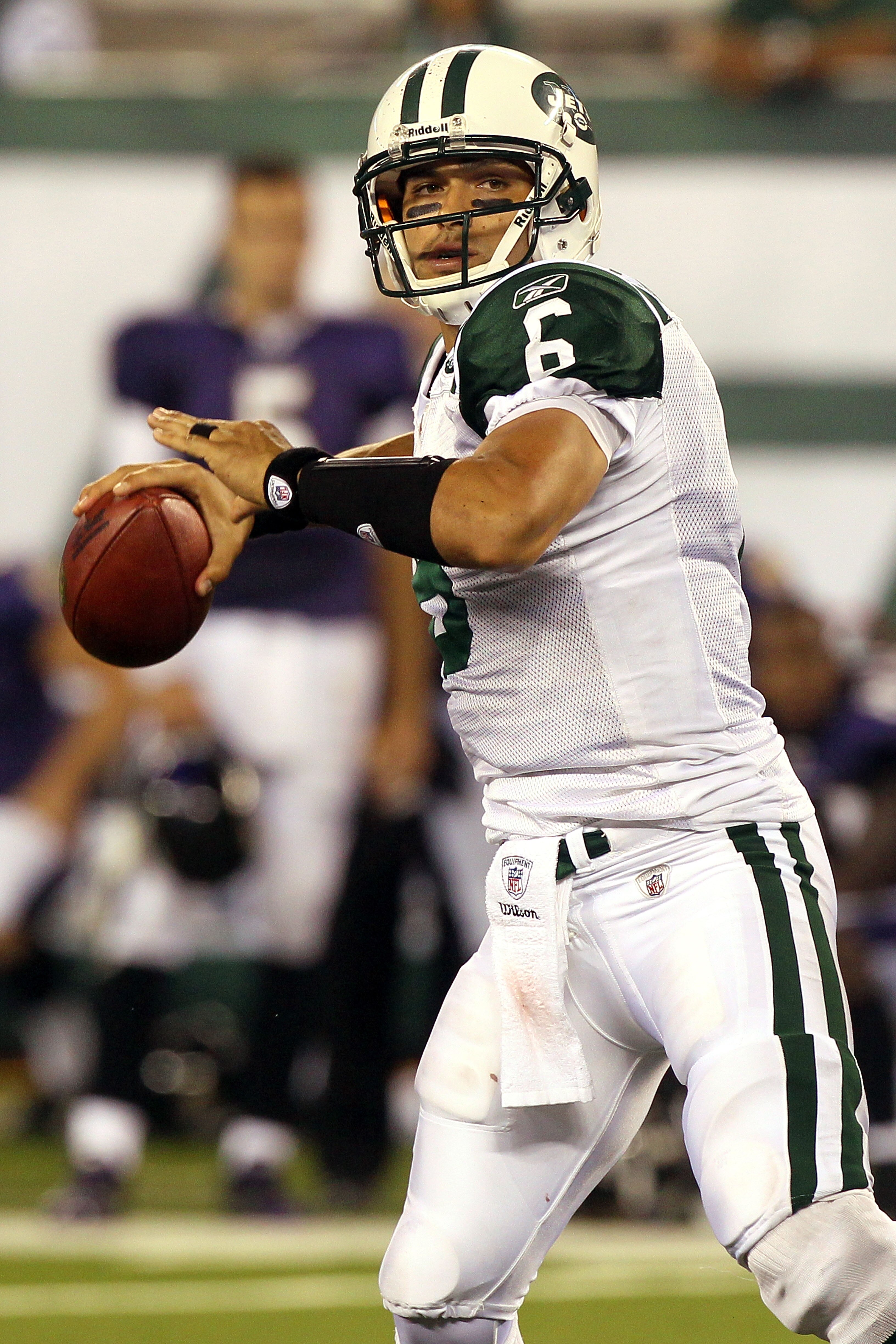 EAST RUTHERFORD, NJ - SEPTEMBER 13:  Mark Sanchez #6 of the New York Jets throws a pass against the Baltimore Ravens during their home opener at the New Meadowlands Stadium on September 13, 2010 in East Rutherford, New Jersey.  (Photo by Jim McIsaac/Getty