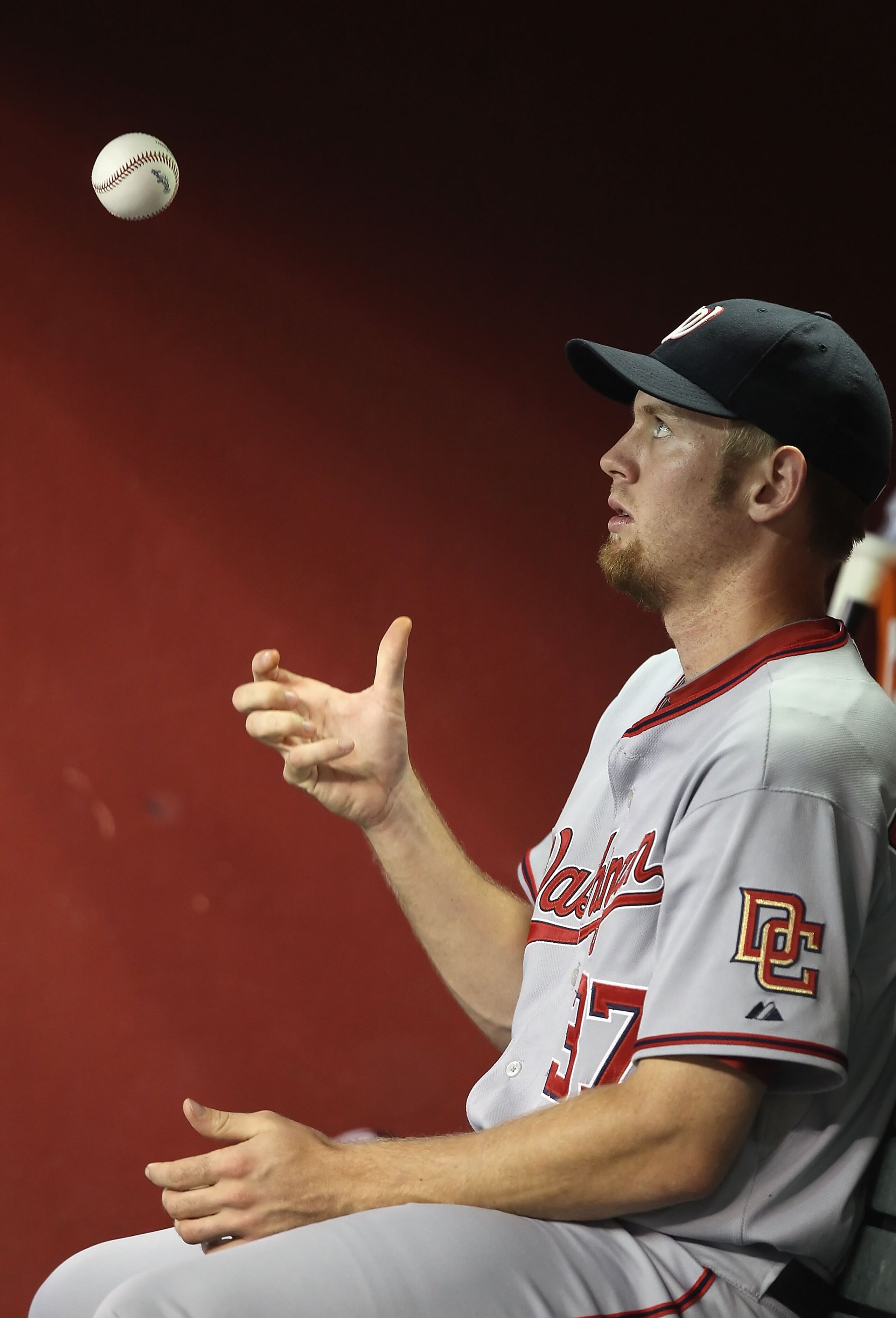 PHOENIX - AUGUST 04:  Pitcher Stephen Strasburg #37 of the Washington Nationals sits in the dugout during the Major League Baseball game against the Arizona Diamondbacks at Chase Field on August 4, 2010 in Phoenix, Arizona.  The Nationals defeated the Dia